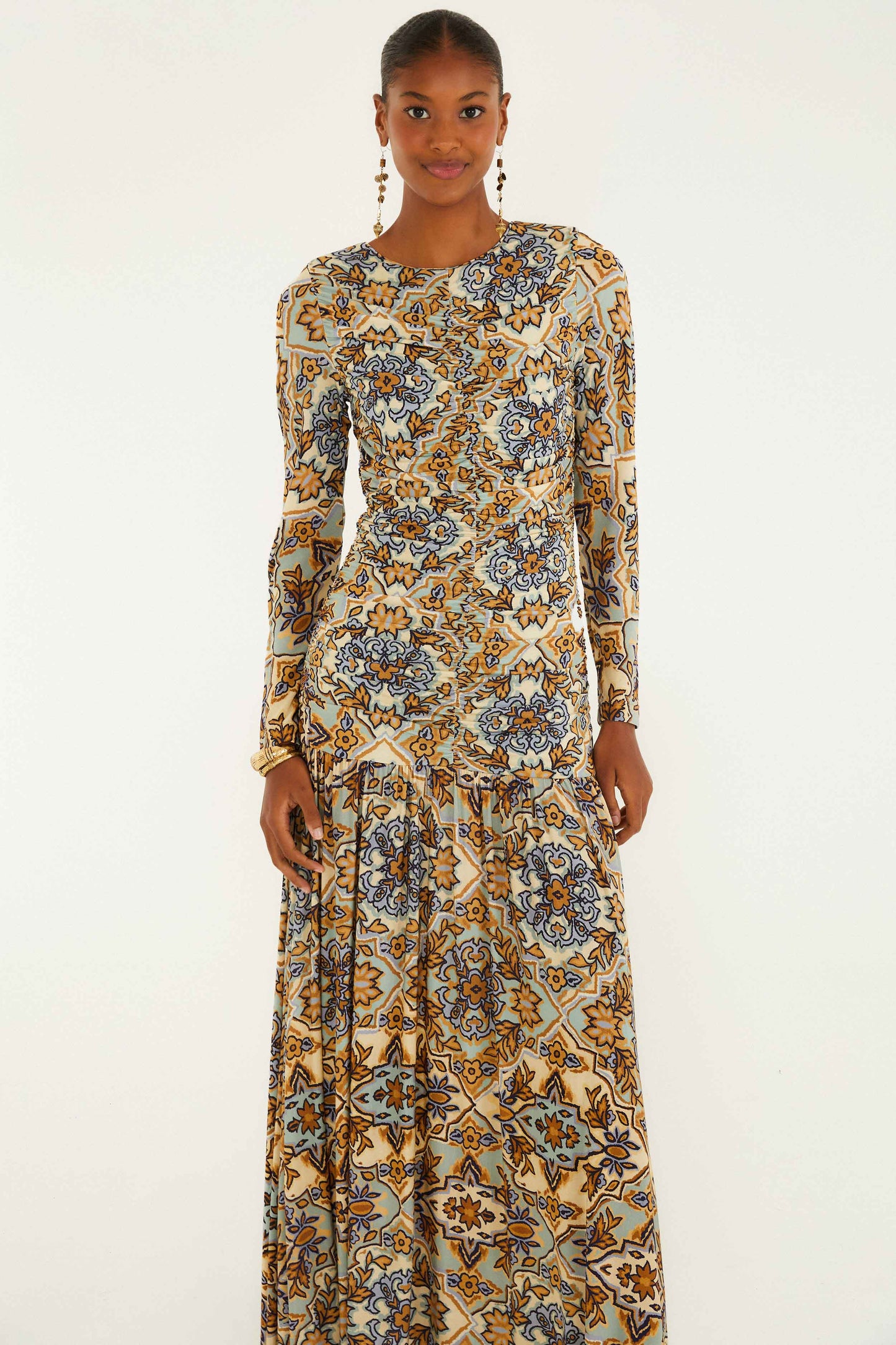 FARM Rio model wearing the Blue Winter Tapestry Long Sleeve Maxi Dress