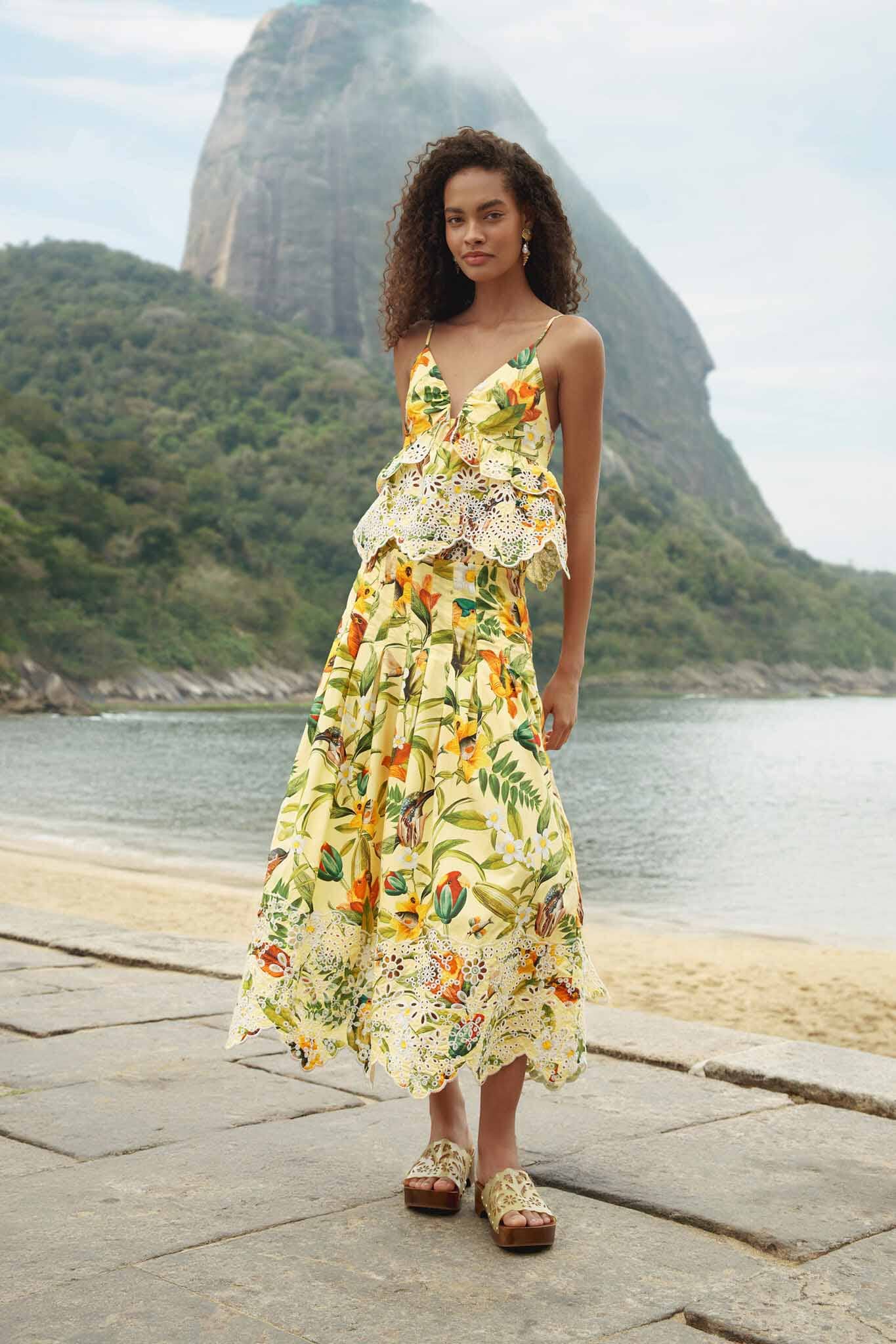 FARM Rio model wearing the Brasil Collage Soft Yellow Maxi Skirt