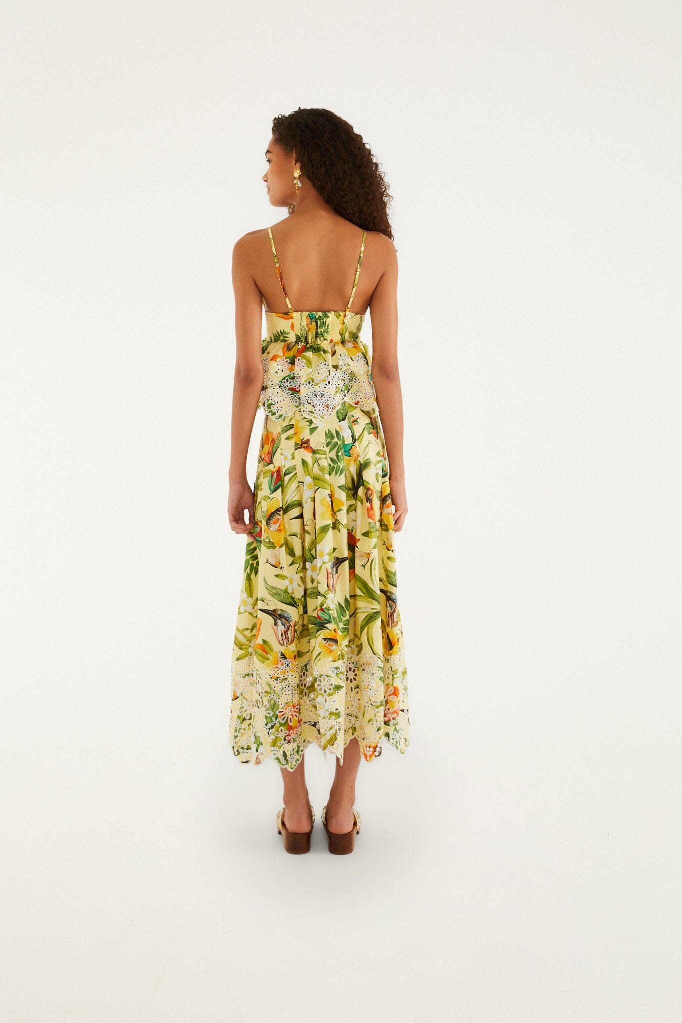 FARM Rio model wearing the Brasil Collage Soft Yellow Maxi Skirt