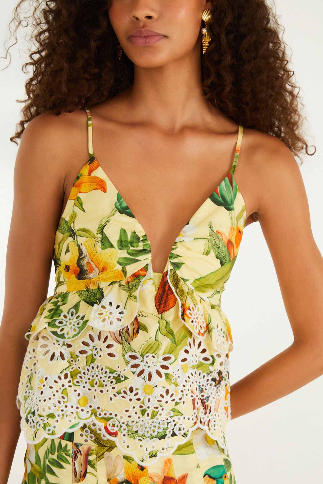 FARM Rio model wearing the Brasil Collage Soft Yellow Ruffles Sleeveless Blou