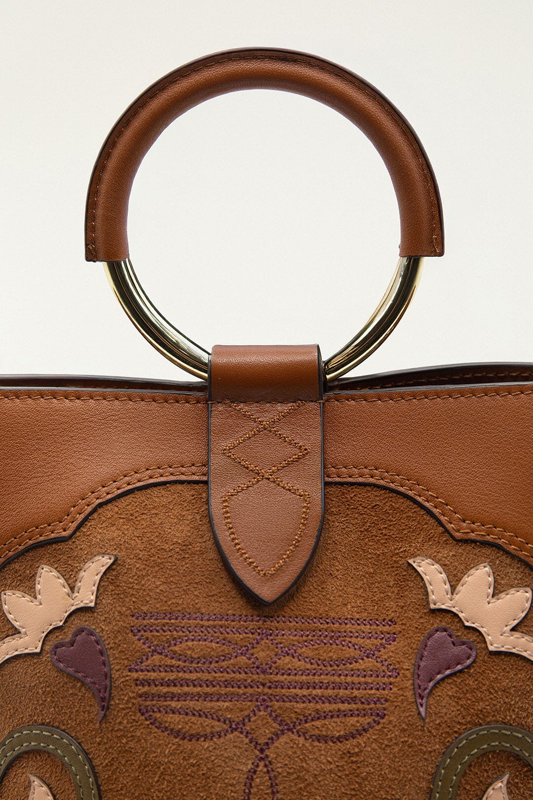 FARM Rio model wearing the Brown Western Embroidered Leather Bucket Bag