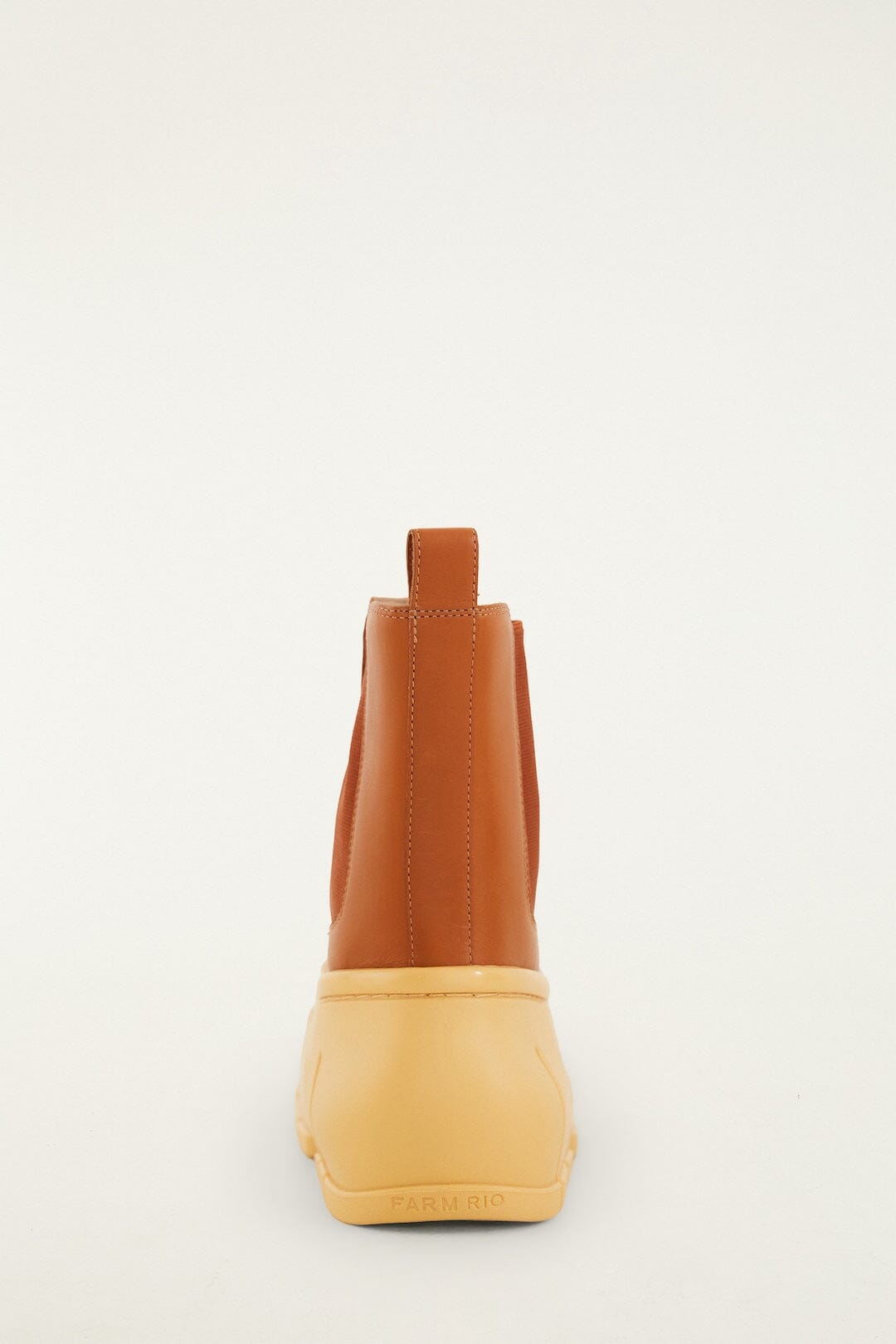 FARM Rio model wearing the Butter Yellow Monstera Rain Chelsea Boot