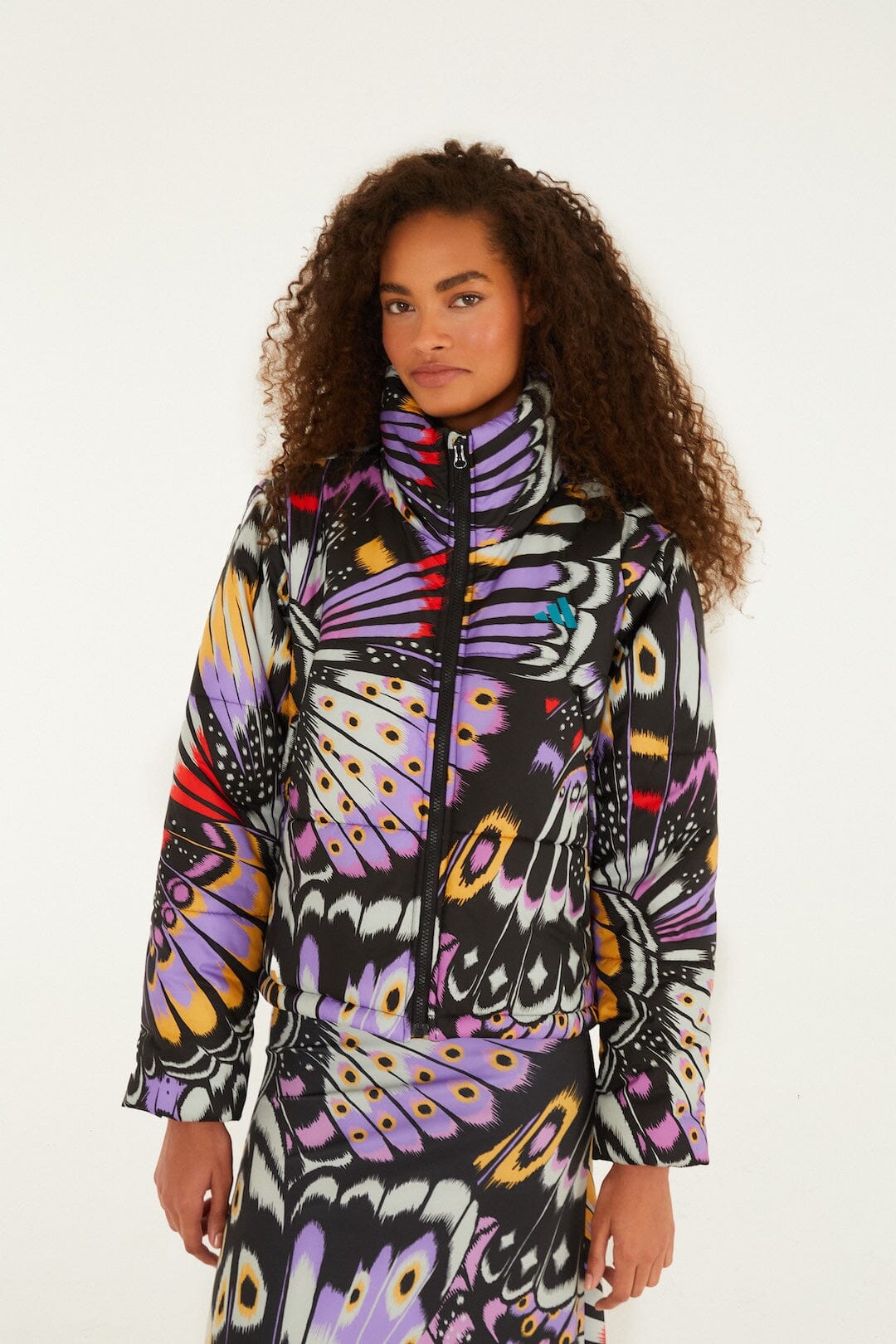 FARM Rio model wearing the Colorfly Lilac Adidas Puffer Jacket