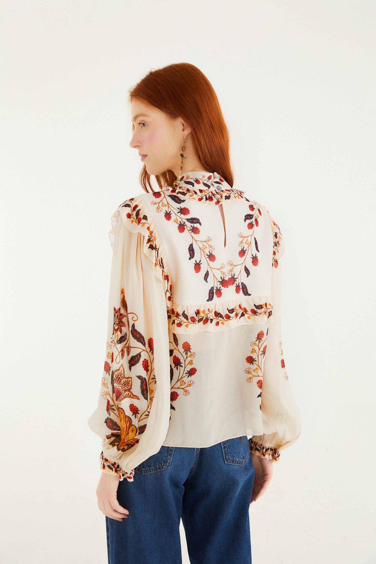 FARM Rio model wearing the Cream Berry Garden Long Sleeve Blouse