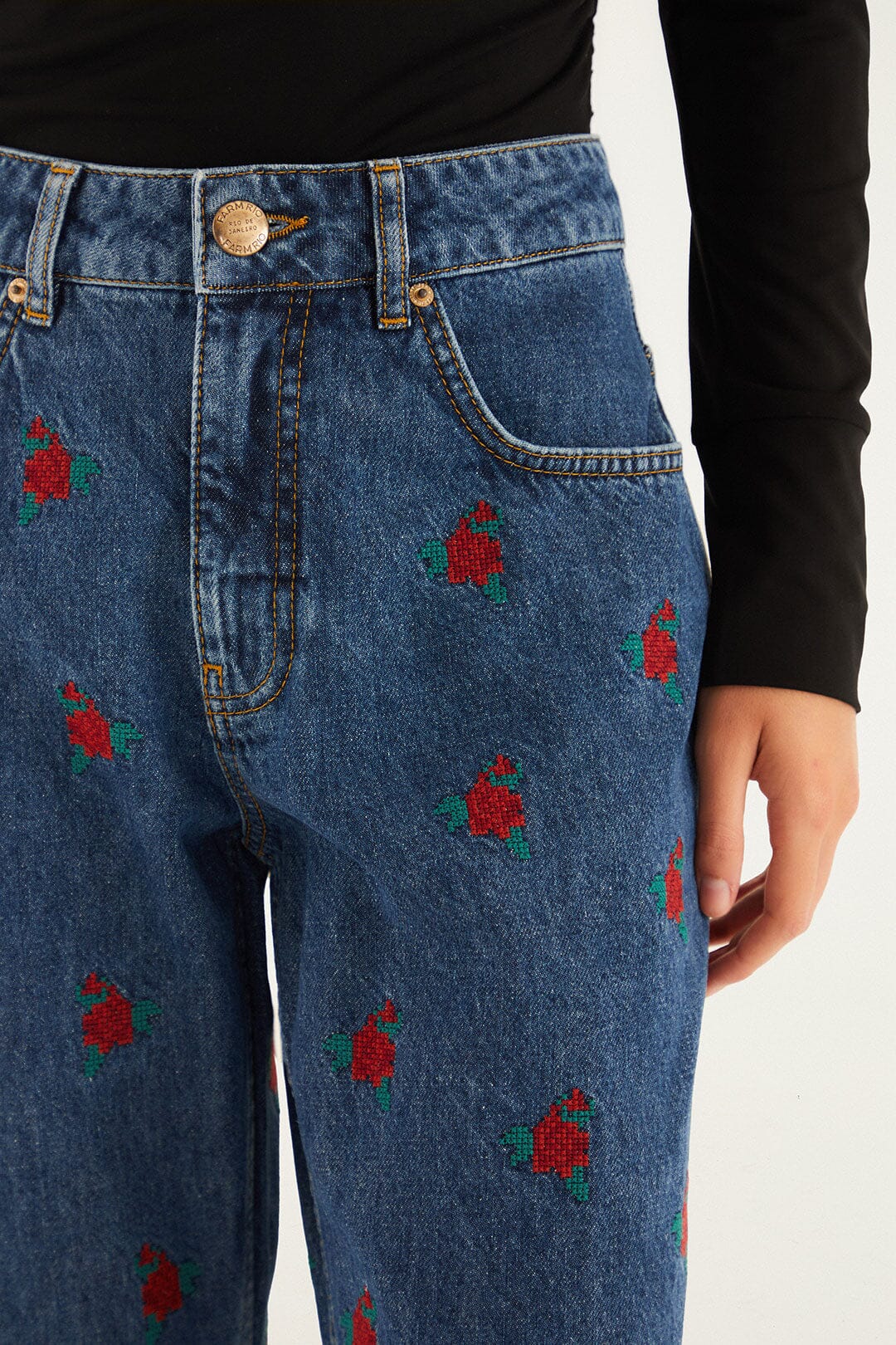 FARM Rio model wearing the Denim Embroidered Flowers Pants