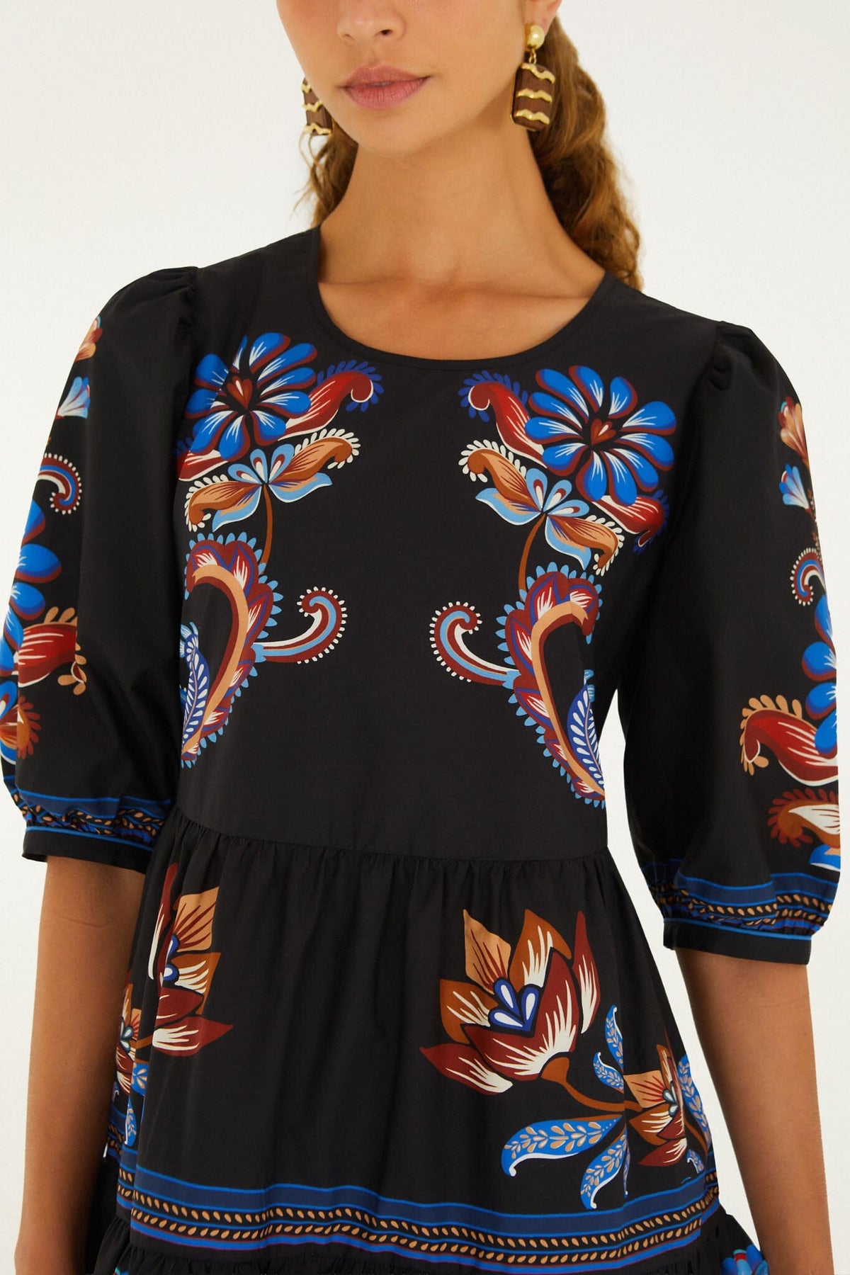 FARM Rio model wearing the Energy Floral Ruffled Hem Mini Dress