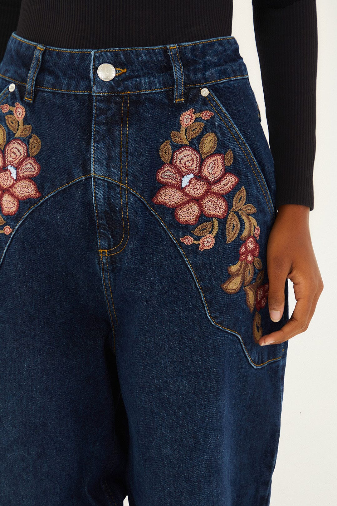 FARM Rio model wearing the Floral Embroidery Denim Pants