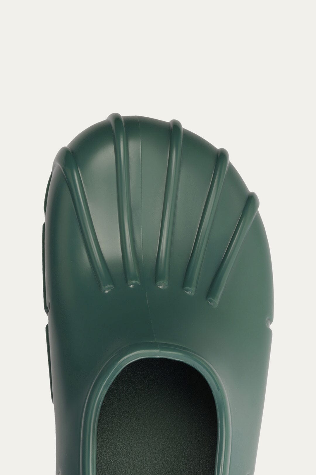 FARM Rio model wearing the Forest Green Monstera Rain Shoe