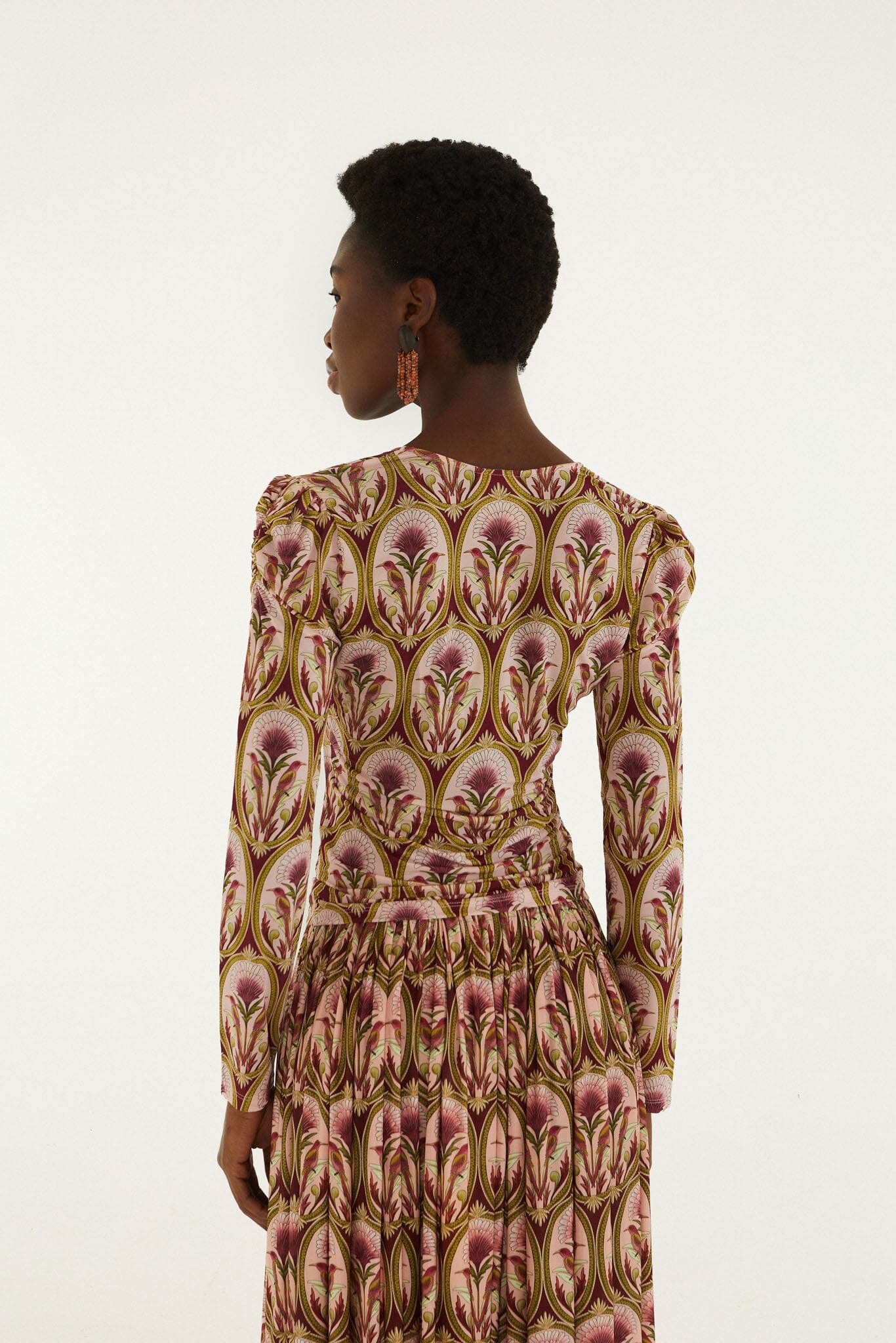 FARM Rio model wearing the Garden Medal Jersey Long Sleeve Blouse