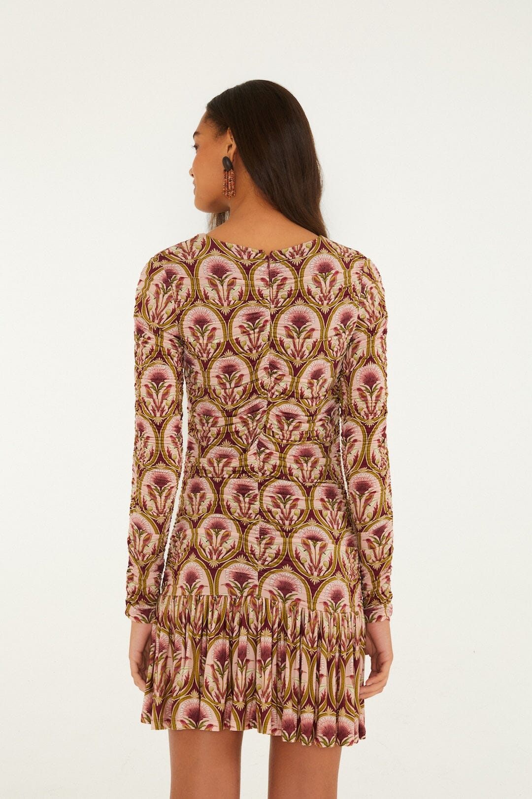 FARM Rio model wearing the Garden Medal Long Sleeve Mini Dress