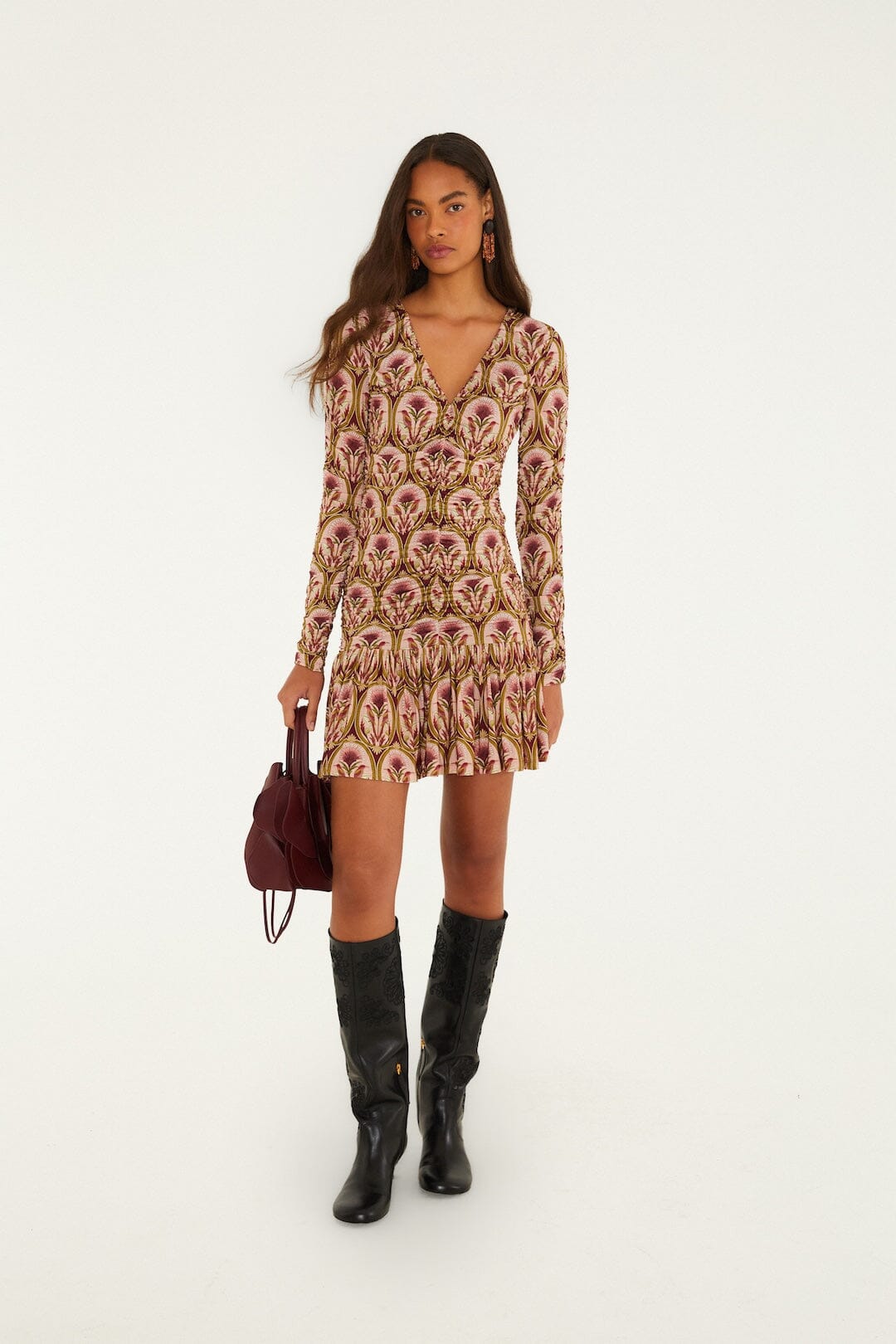 FARM Rio model wearing the Garden Medal Long Sleeve Mini Dress