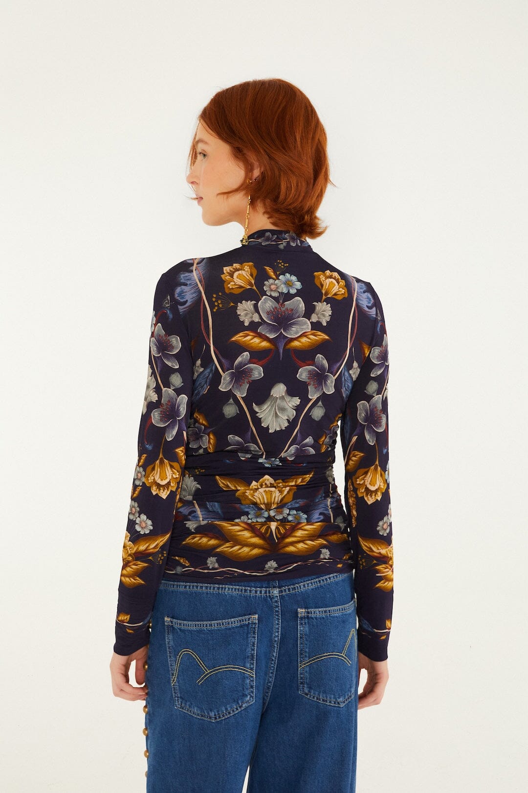 FARM Rio model wearing the Golden Nature Jersey Blouse