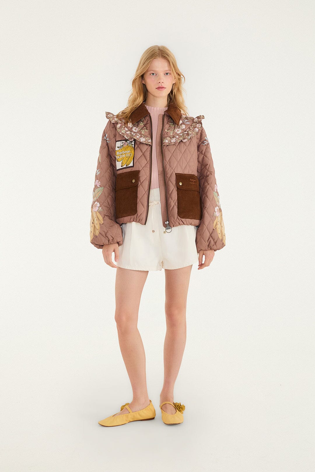FARM Rio model wearing the Heart Of The Tropics Puff Sleeve Quilted Jacket