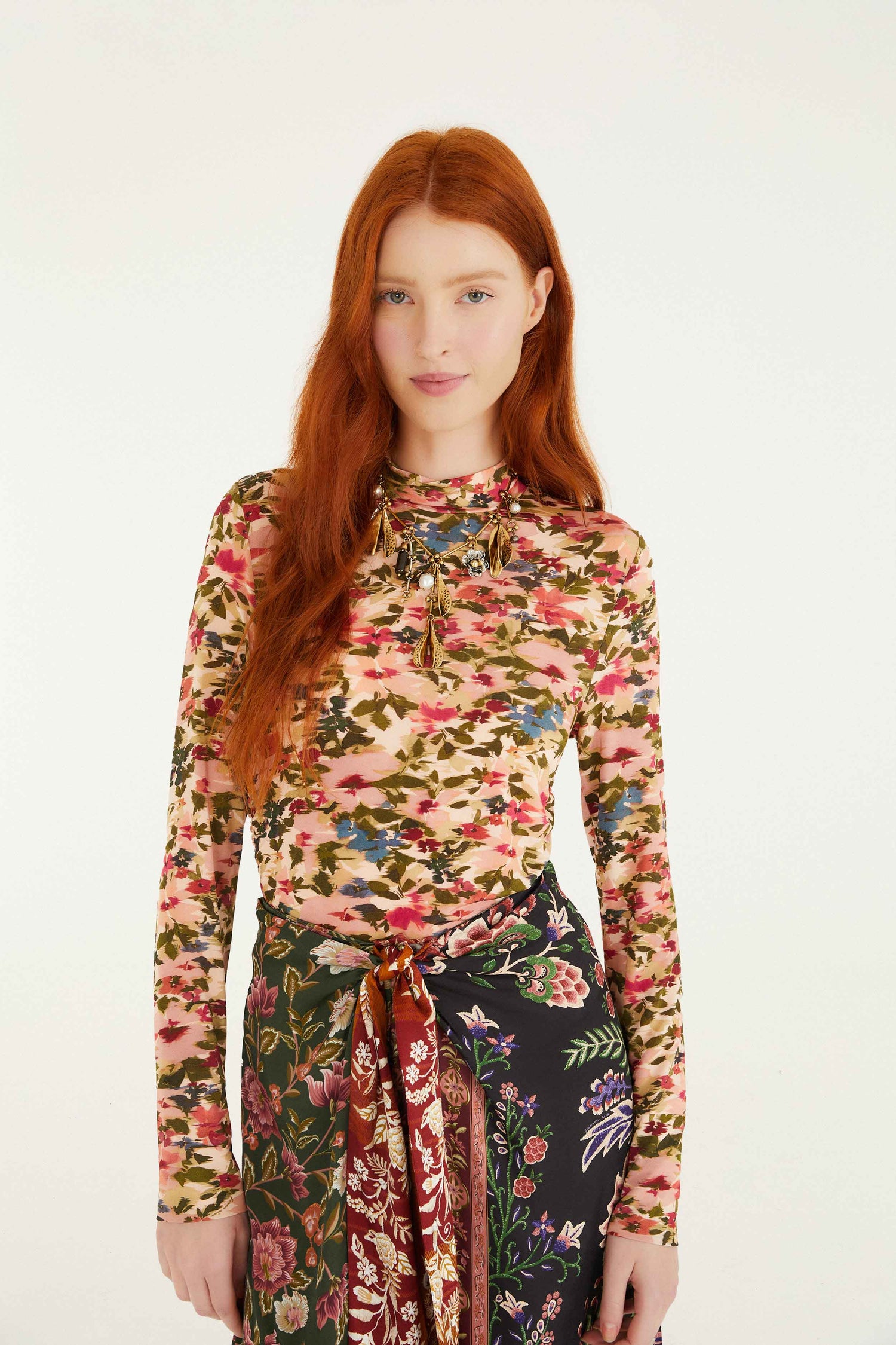 FARM Rio model wearing the Ikat Tiny Flowers Pink Jersey Blouse