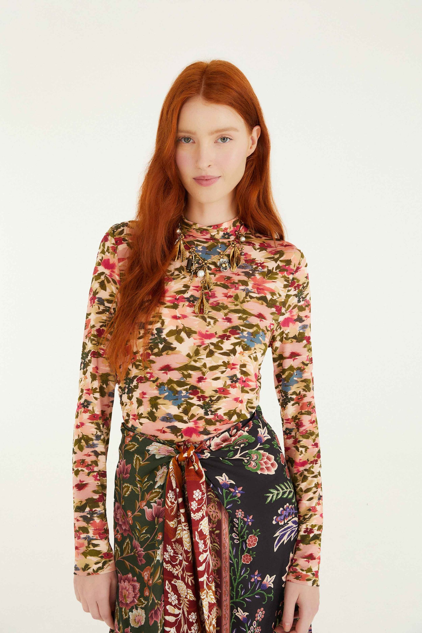 FARM Rio model wearing the Ikat Tiny Flowers Pink Jersey Blouse