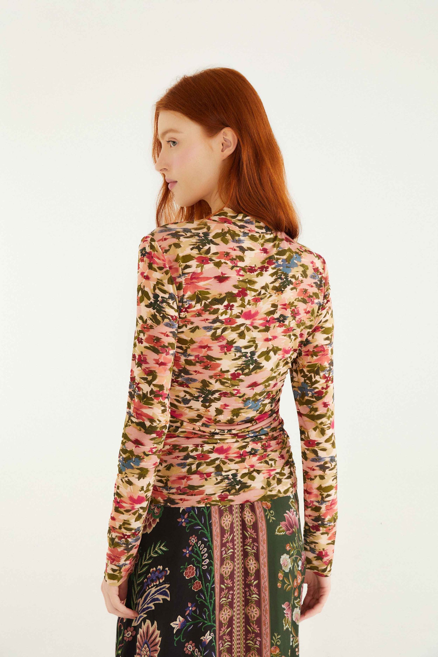 FARM Rio model wearing the Ikat Tiny Flowers Pink Jersey Blouse