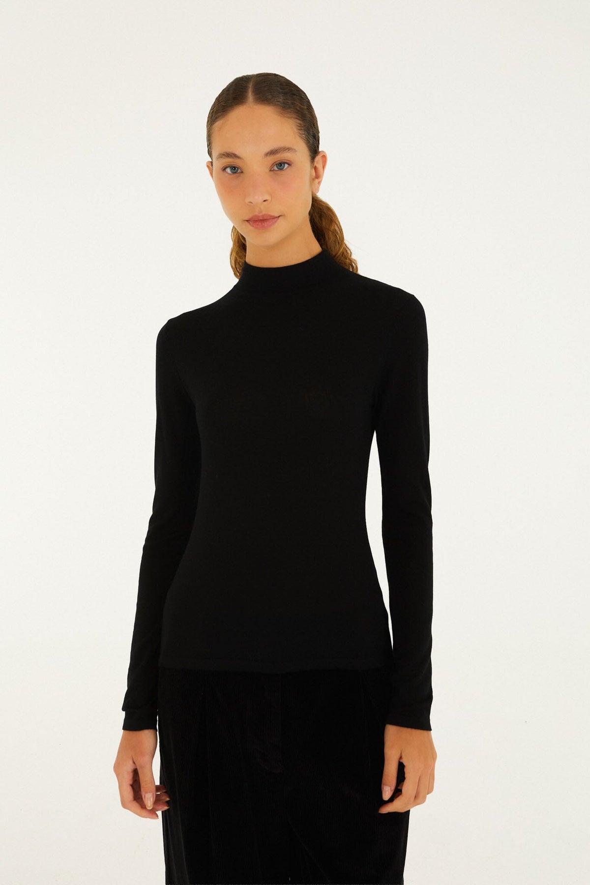 FARM Rio model wearing the Knit Turtleneck Top