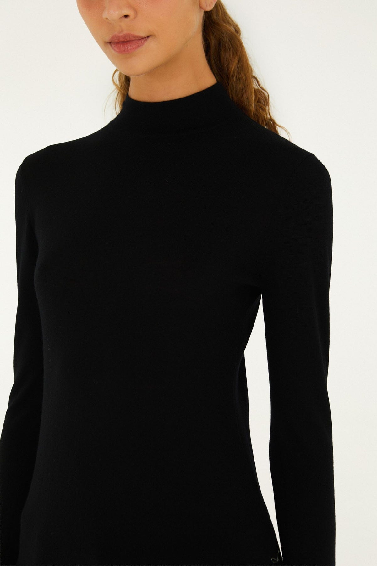 FARM Rio model wearing the Knit Turtleneck Top