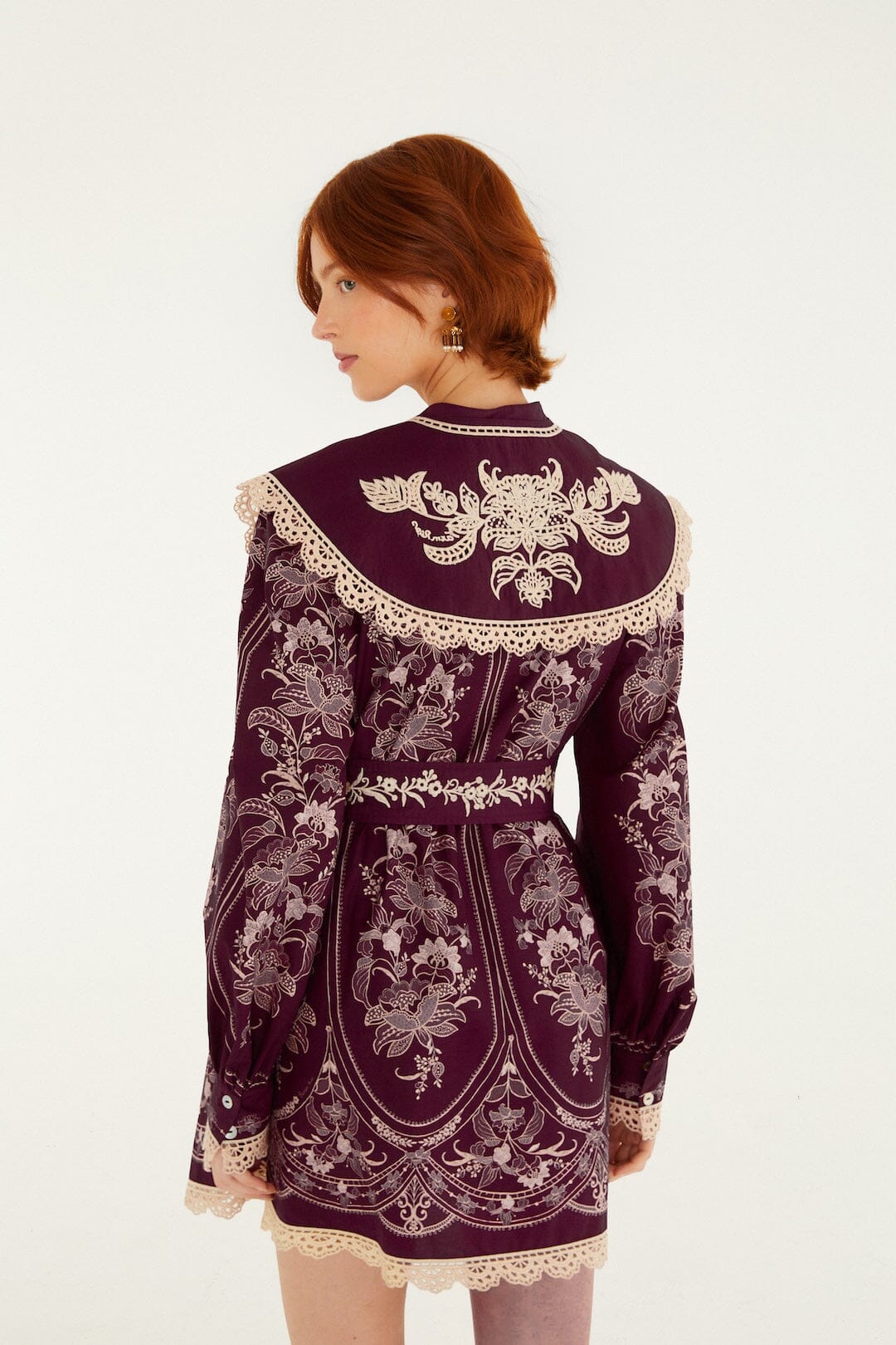 FARM Rio model wearing the Lara Lace Long Sleeve Mini Dress