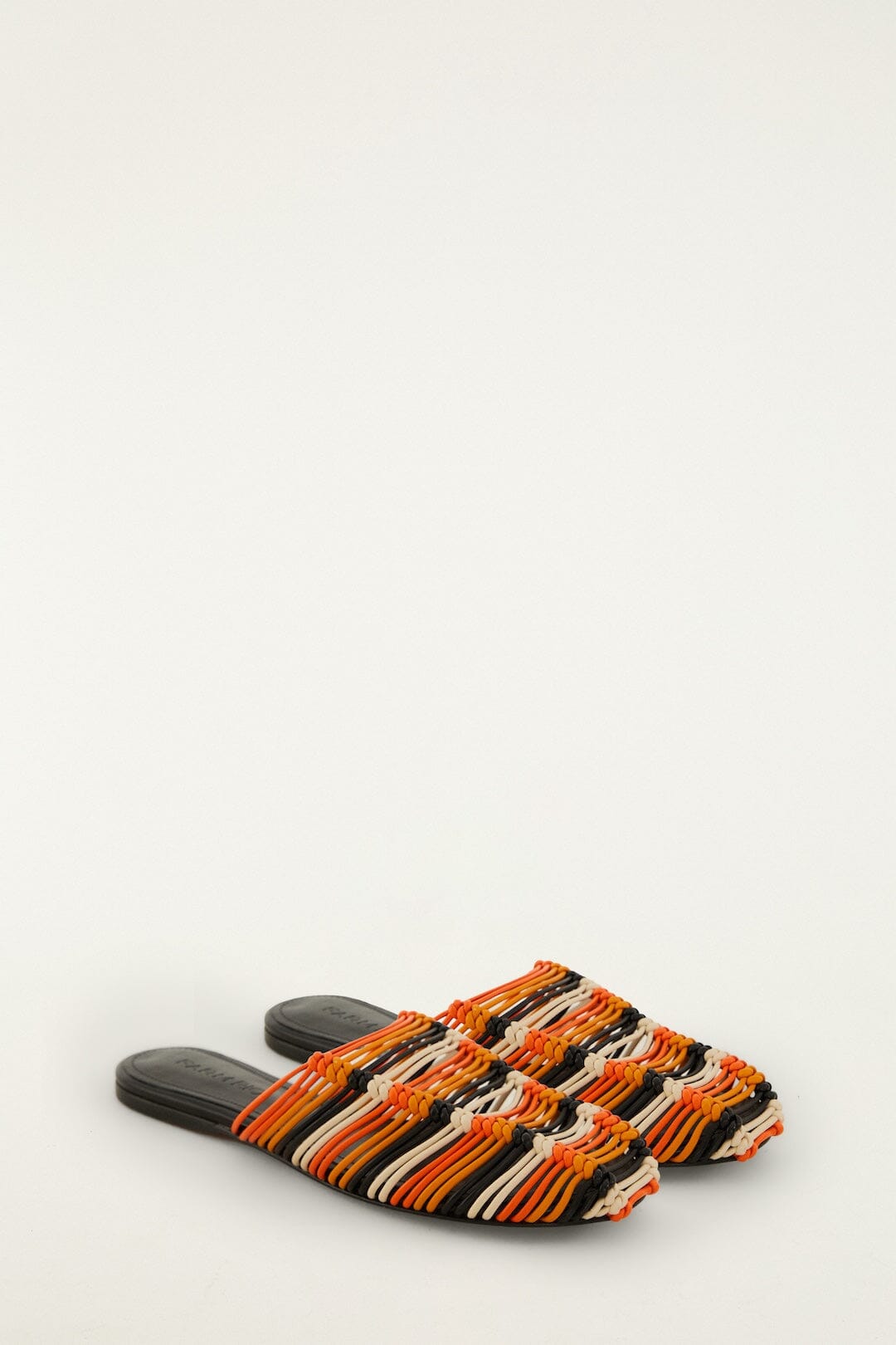 FARM Rio model wearing the Macrame Flat Mule