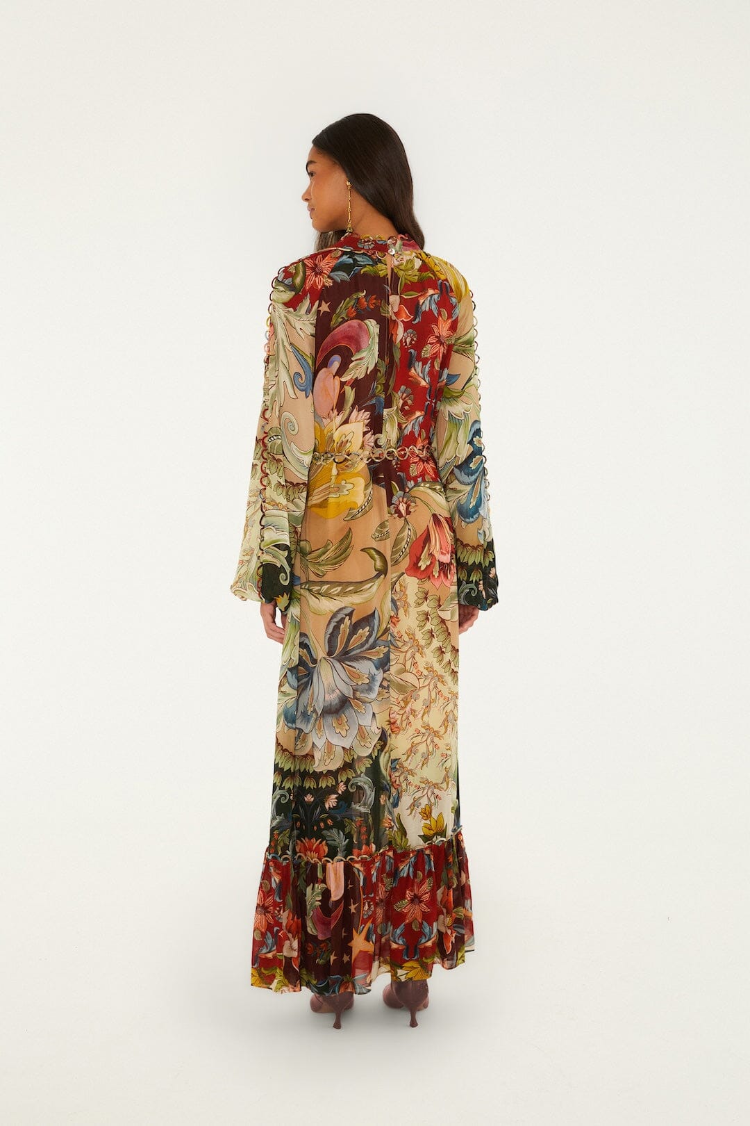 FARM Rio model wearing the Mixed Lunar Boho Long Sleeve Maxi Dress