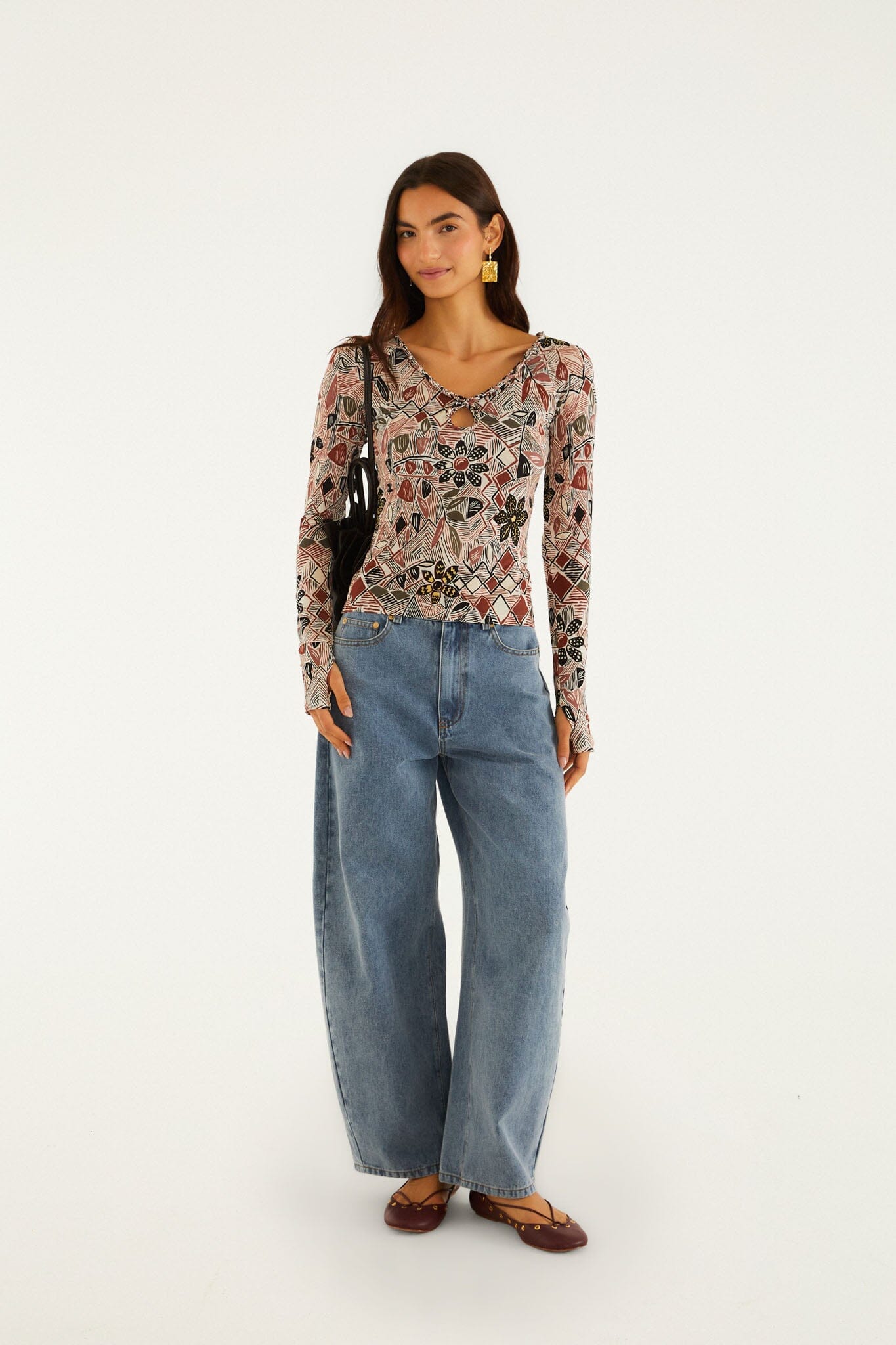 FARM Rio model wearing the Multicolor Rustic Flowers Long Sleeve Top