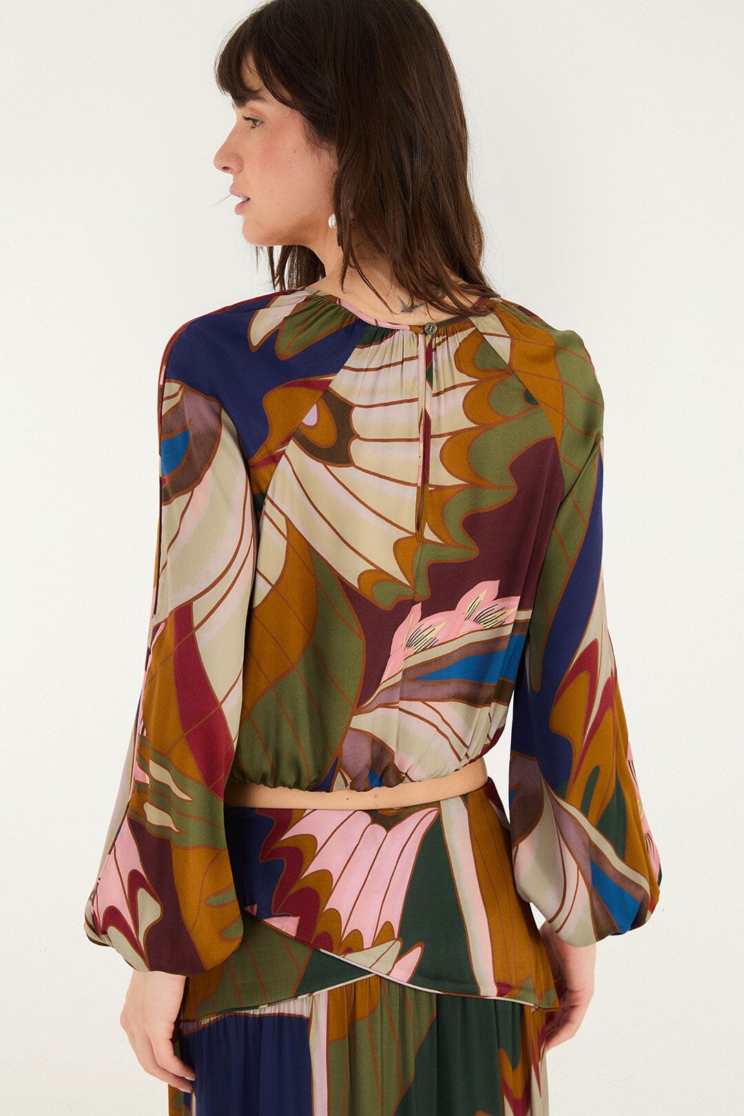 FARM Rio model wearing the Mystical Paradise Long Sleeve Blouse