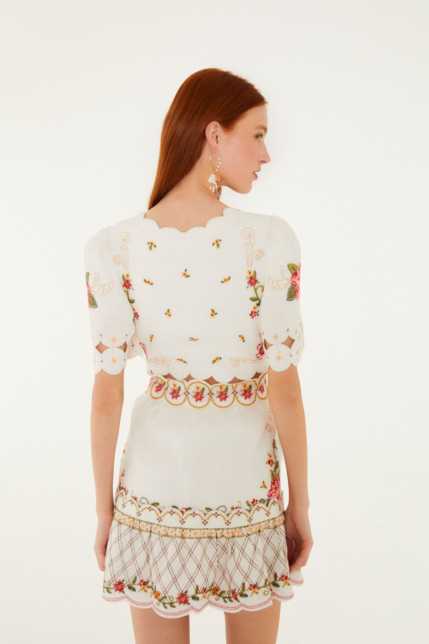 FARM Rio model wearing the Off-White Flower Embroidery Scalloped Mini Dress
