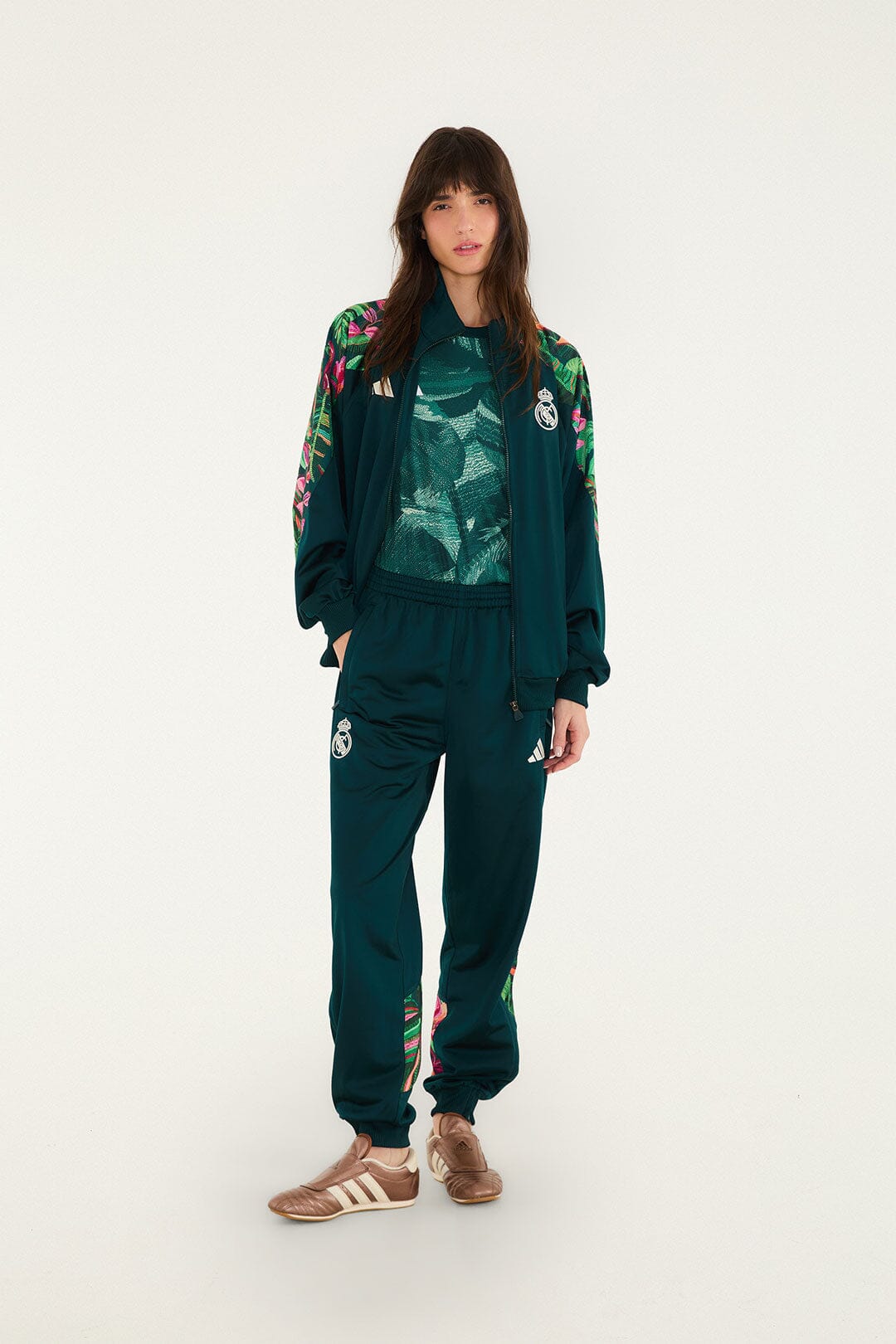 FARM Rio model wearing the Real Foliage Green Adidas Pants