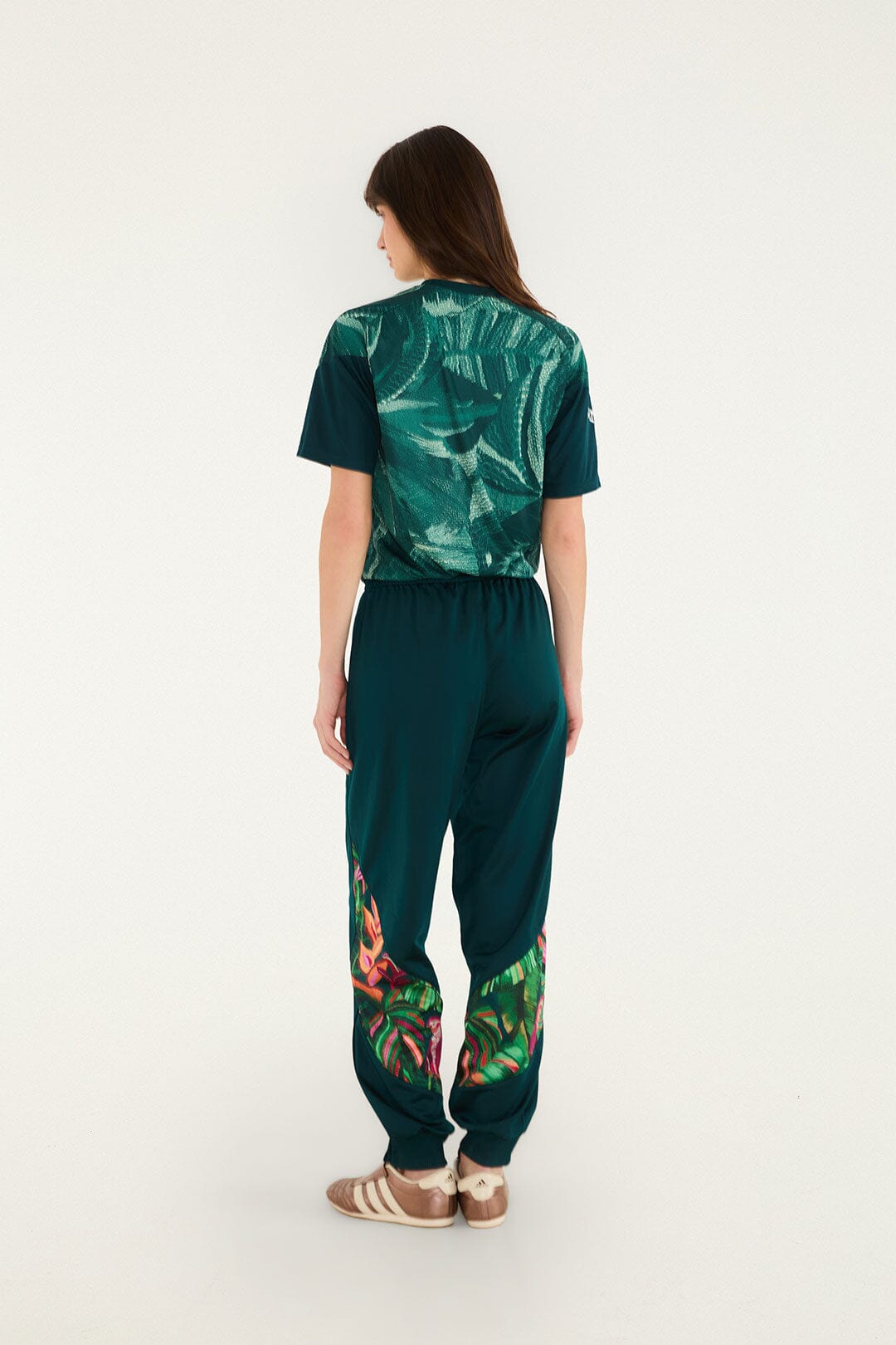 FARM Rio model wearing the Real Foliage Green Adidas Pants