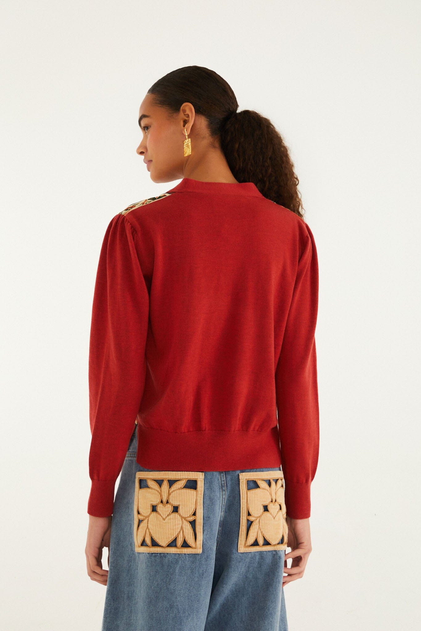 FARM Rio model wearing the Red Ainika Garden Scarf Buttoned Knit Cardigan