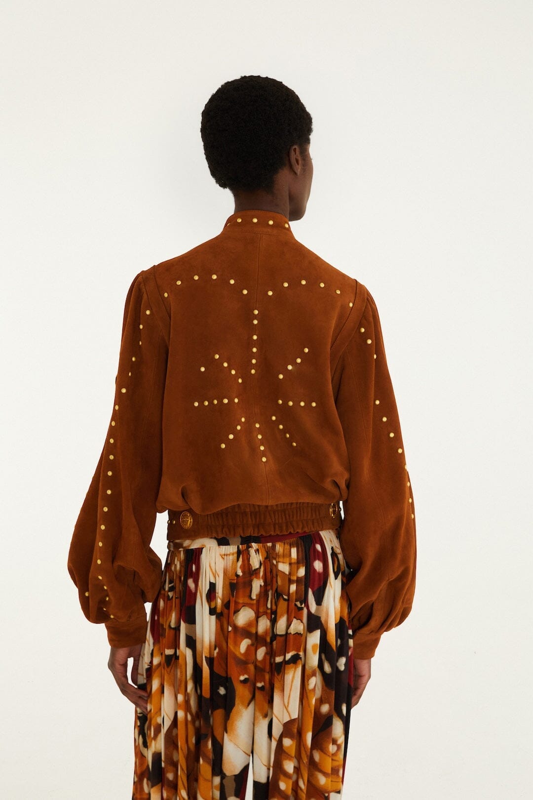 Veste en cuir boutonnée à rivets