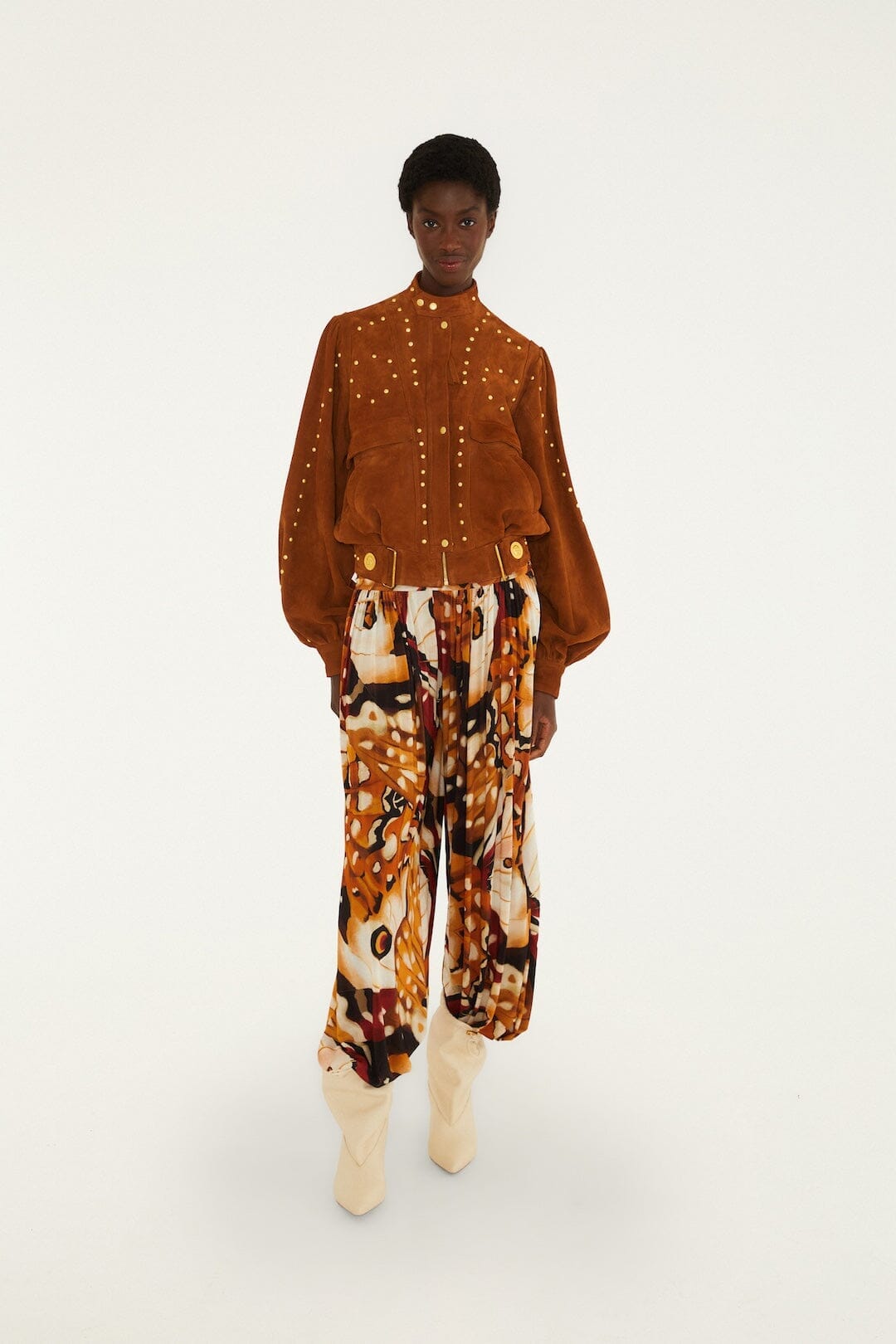 Veste en cuir boutonnée à rivets