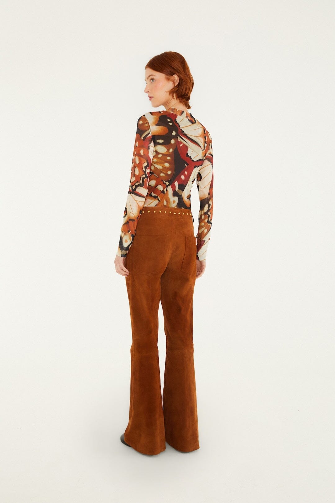 Pantalon en cuir évasé à rivets