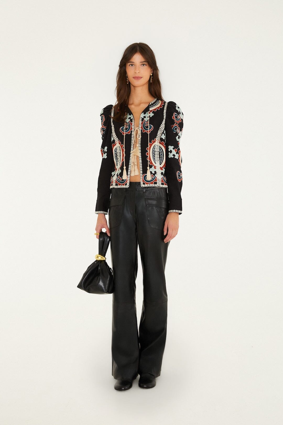 FARM Rio model wearing the Riveted Wide-Leg Leather Trousers