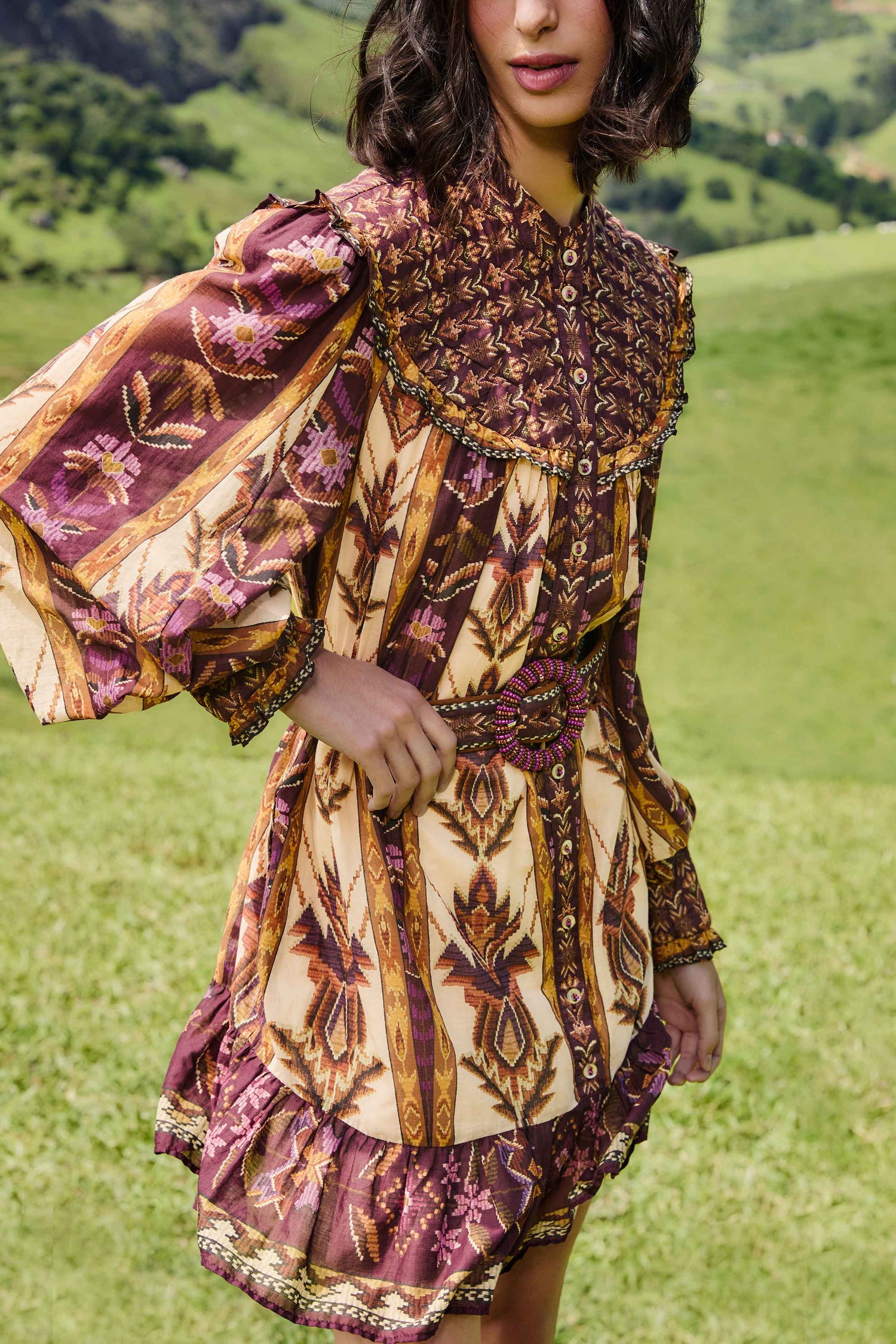 FARM Rio model wearing the Sand Embroidered Tapestry Long Sleeve Mini Dress