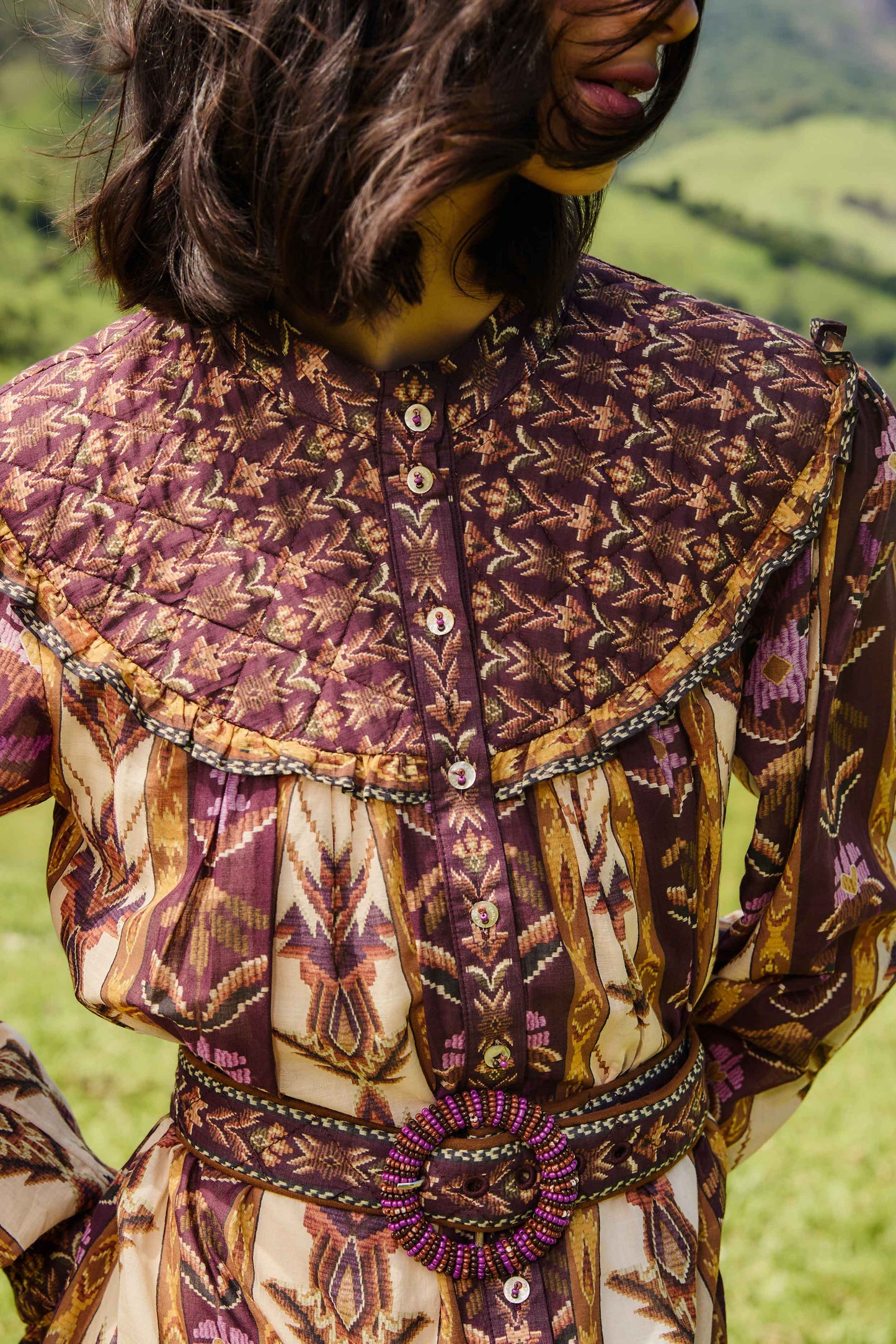 FARM Rio model wearing the Sand Embroidered Tapestry Long Sleeve Mini Dress