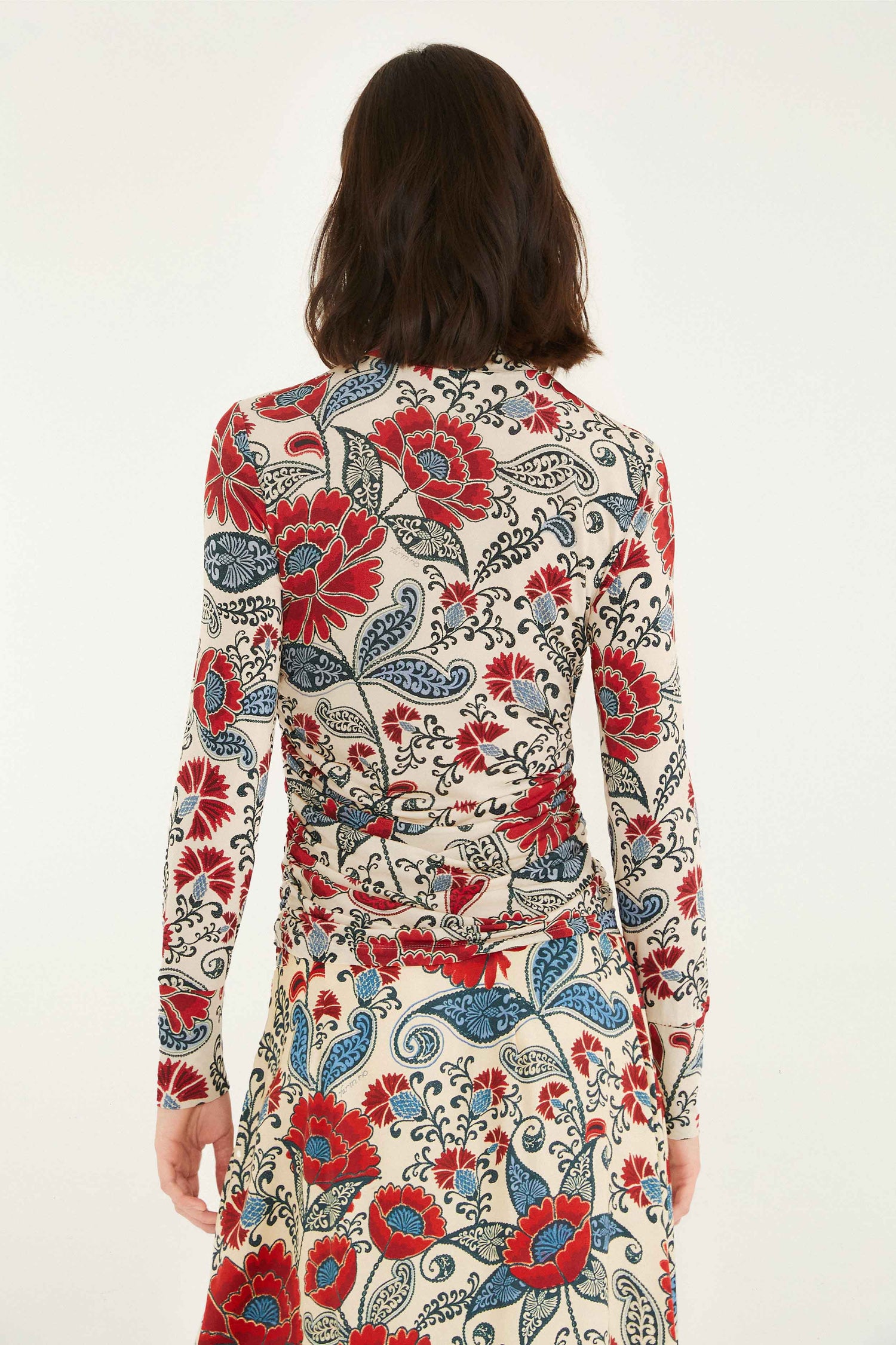 FARM Rio model wearing the Sand Francesca Jersey Blouse