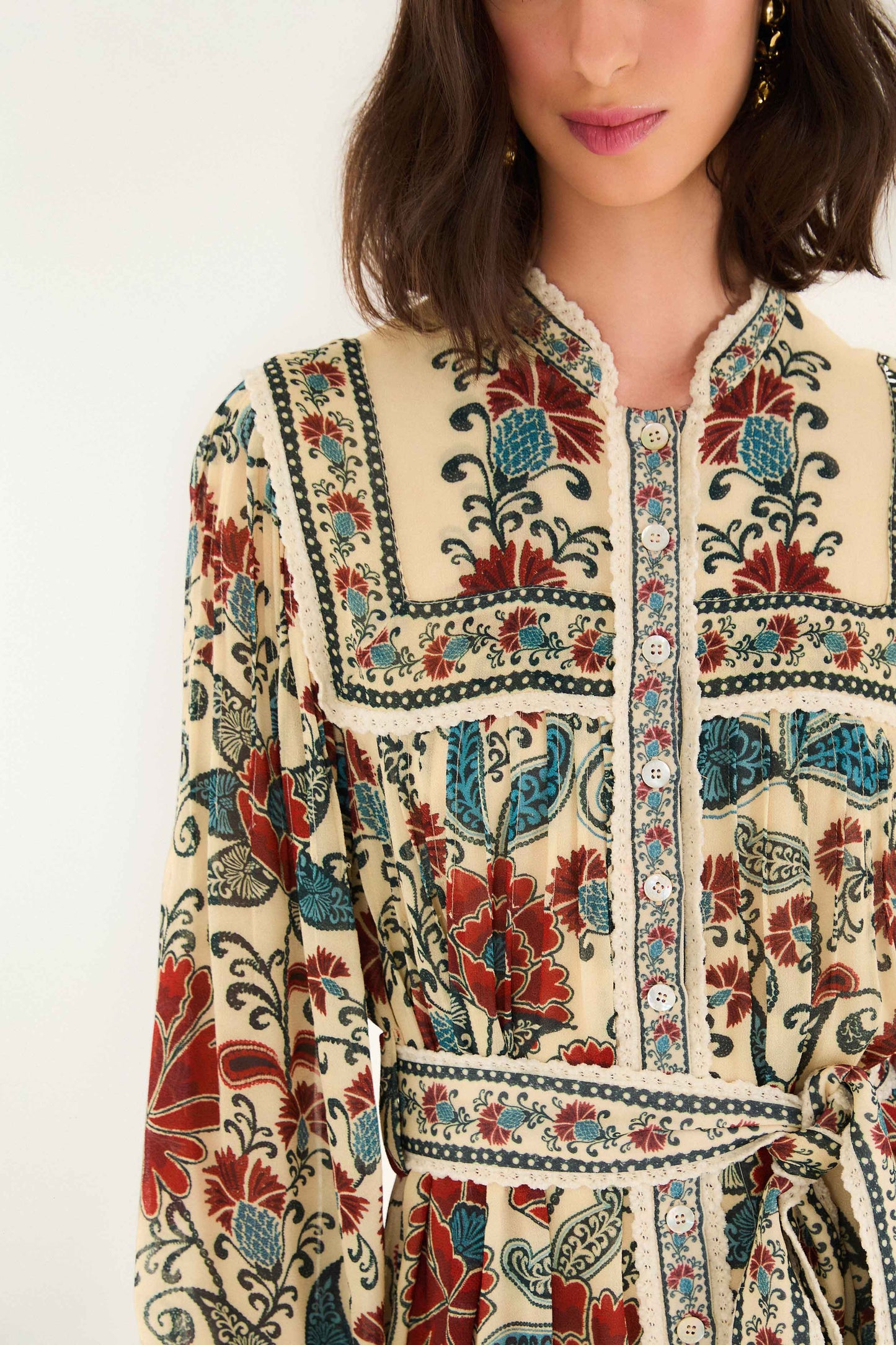 FARM Rio model wearing the Sand Francesca Long Sleeve Mini Dress