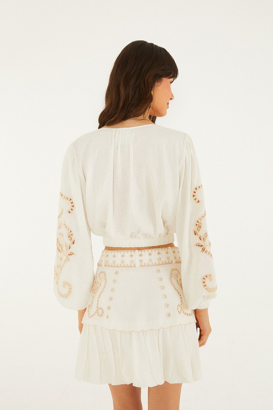 FARM Rio model wearing the Sand Richilieu Mini Skirt
