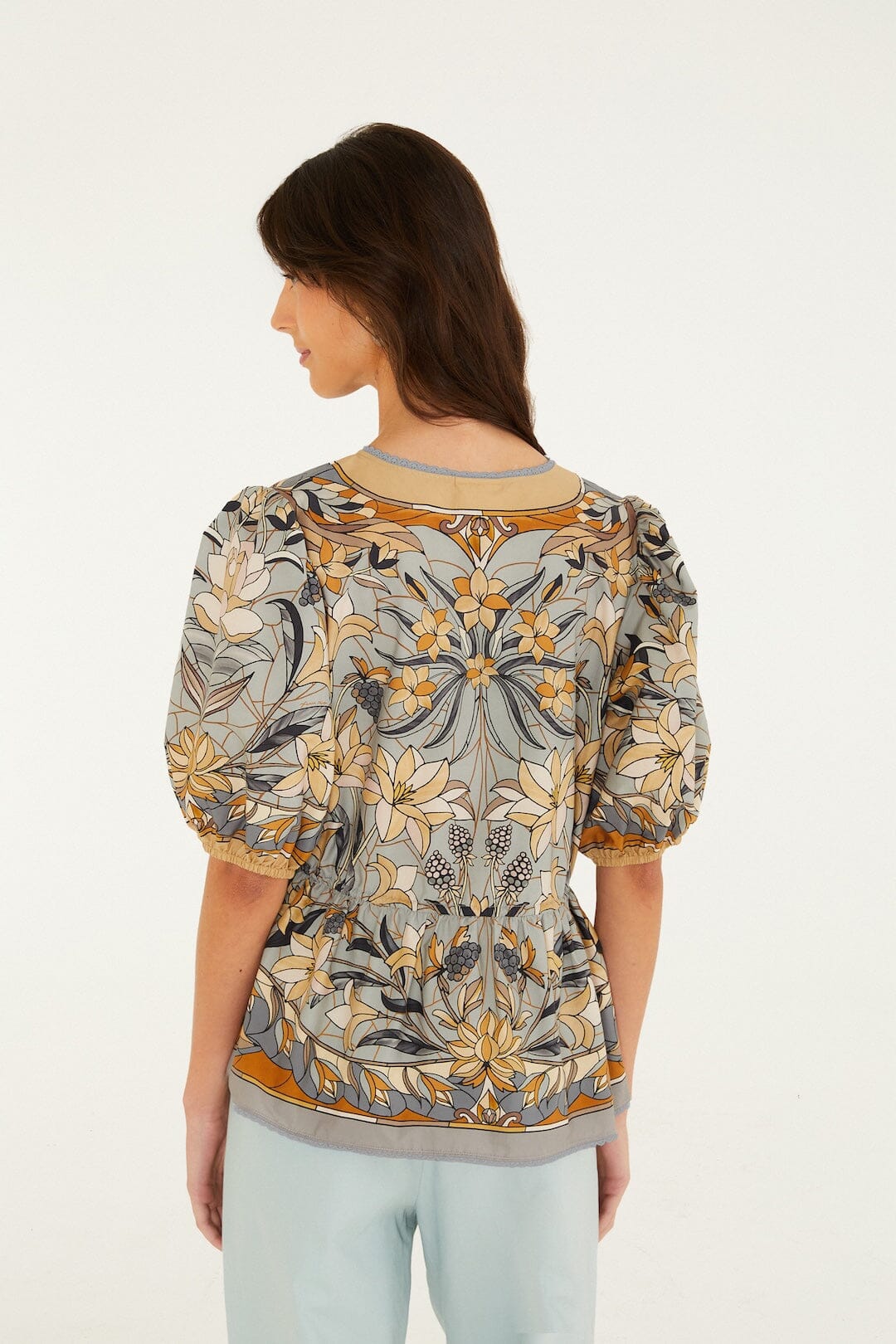 FARM Rio model wearing the Stained Glass Beauty Blouse
