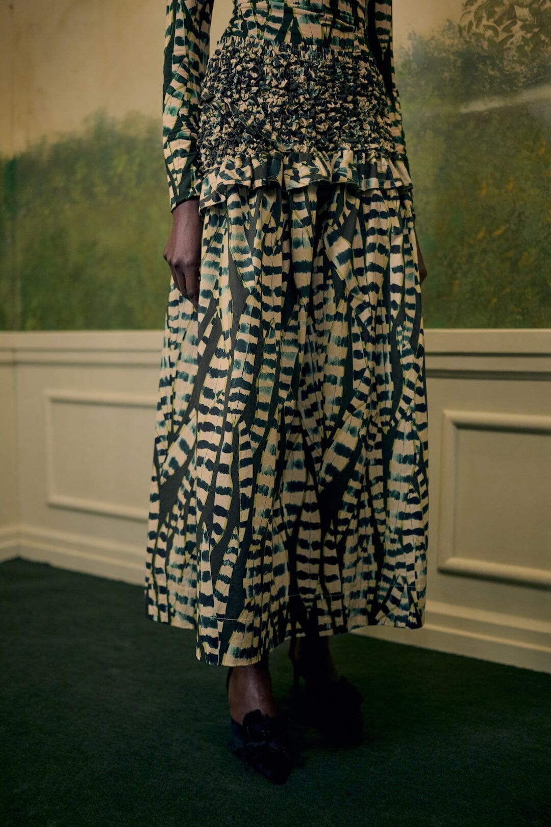 FARM Rio model wearing the Striped Leaves Smocked Maxi Skirt
