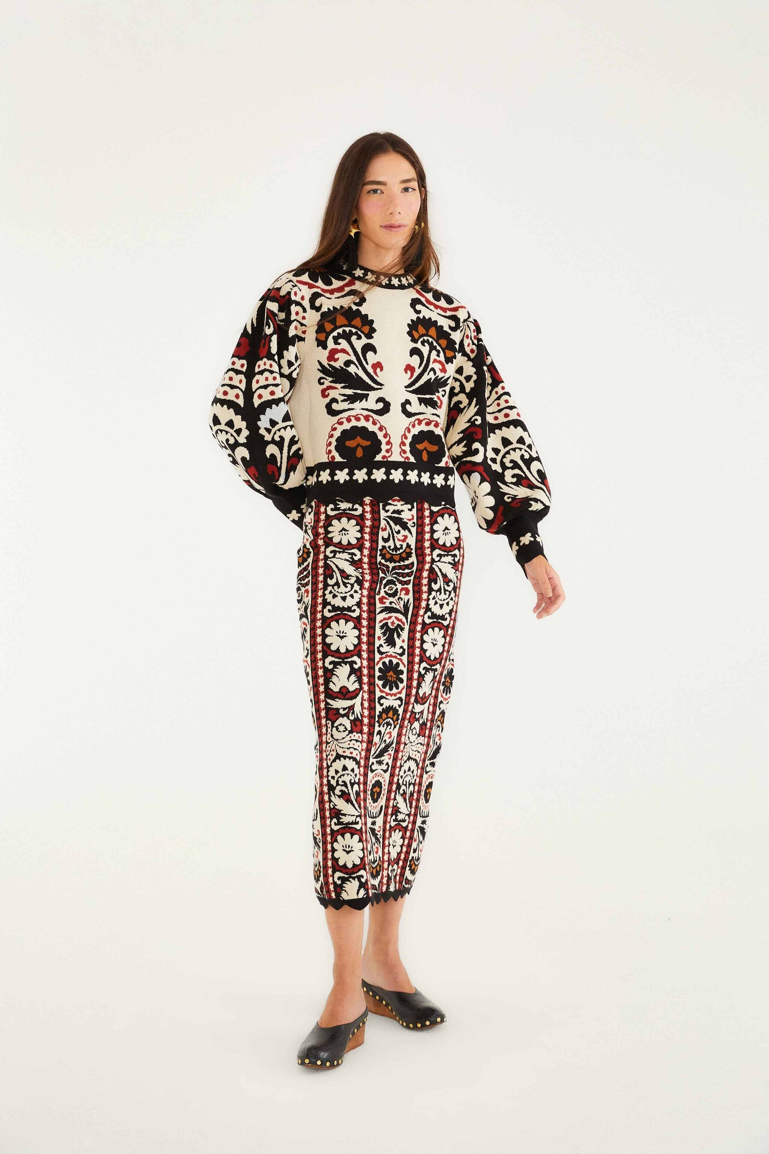 FARM Rio model wearing the Stripes Winter Tapestry Knit Sweater