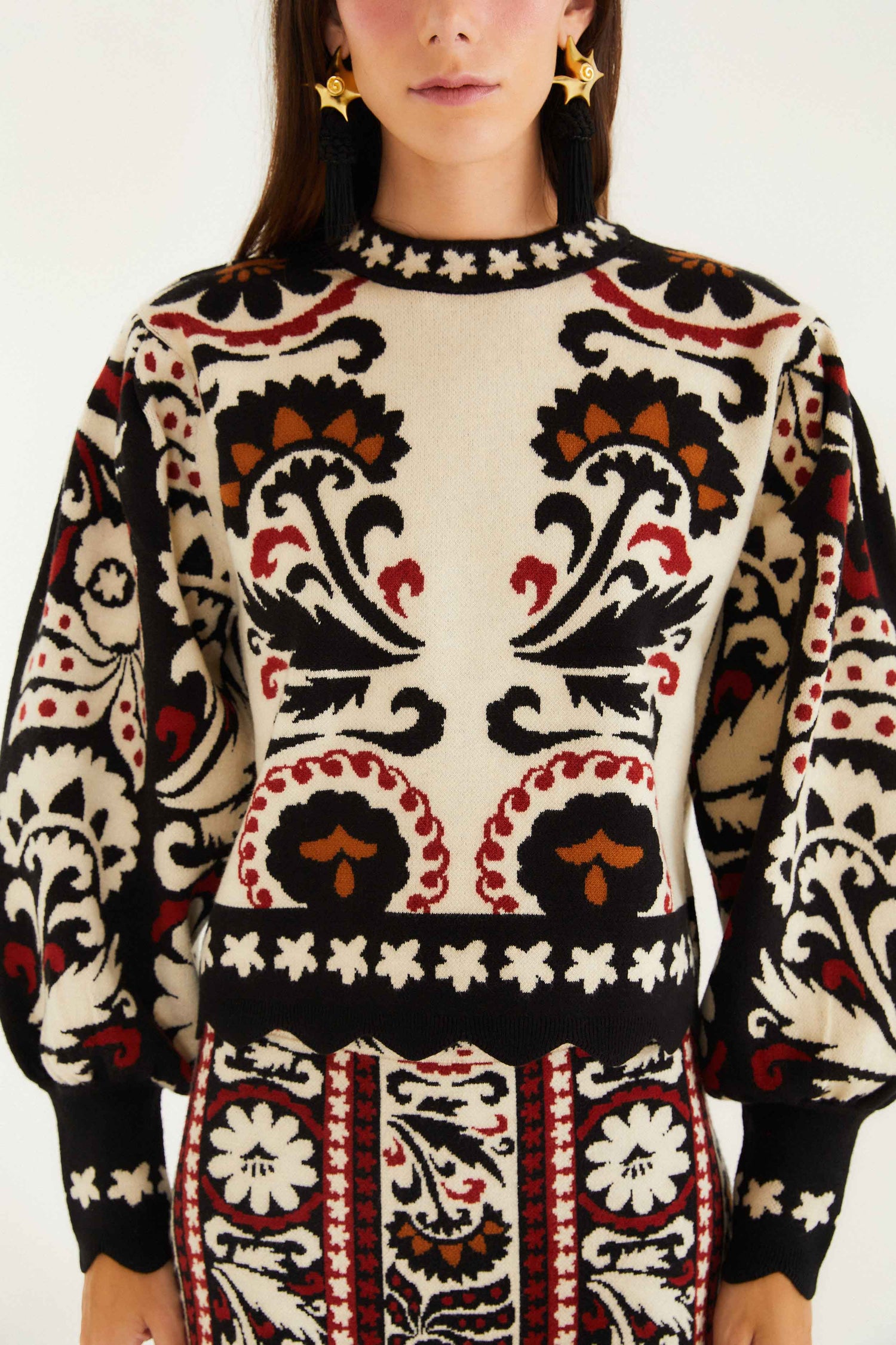 FARM Rio model wearing the Stripes Winter Tapestry Knit Sweater