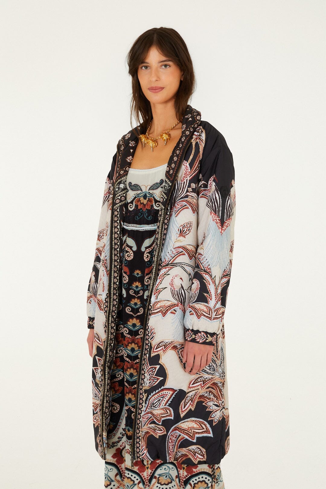 FARM Rio model wearing the Tapestry Dream Reversible Midi Puffer Jacket