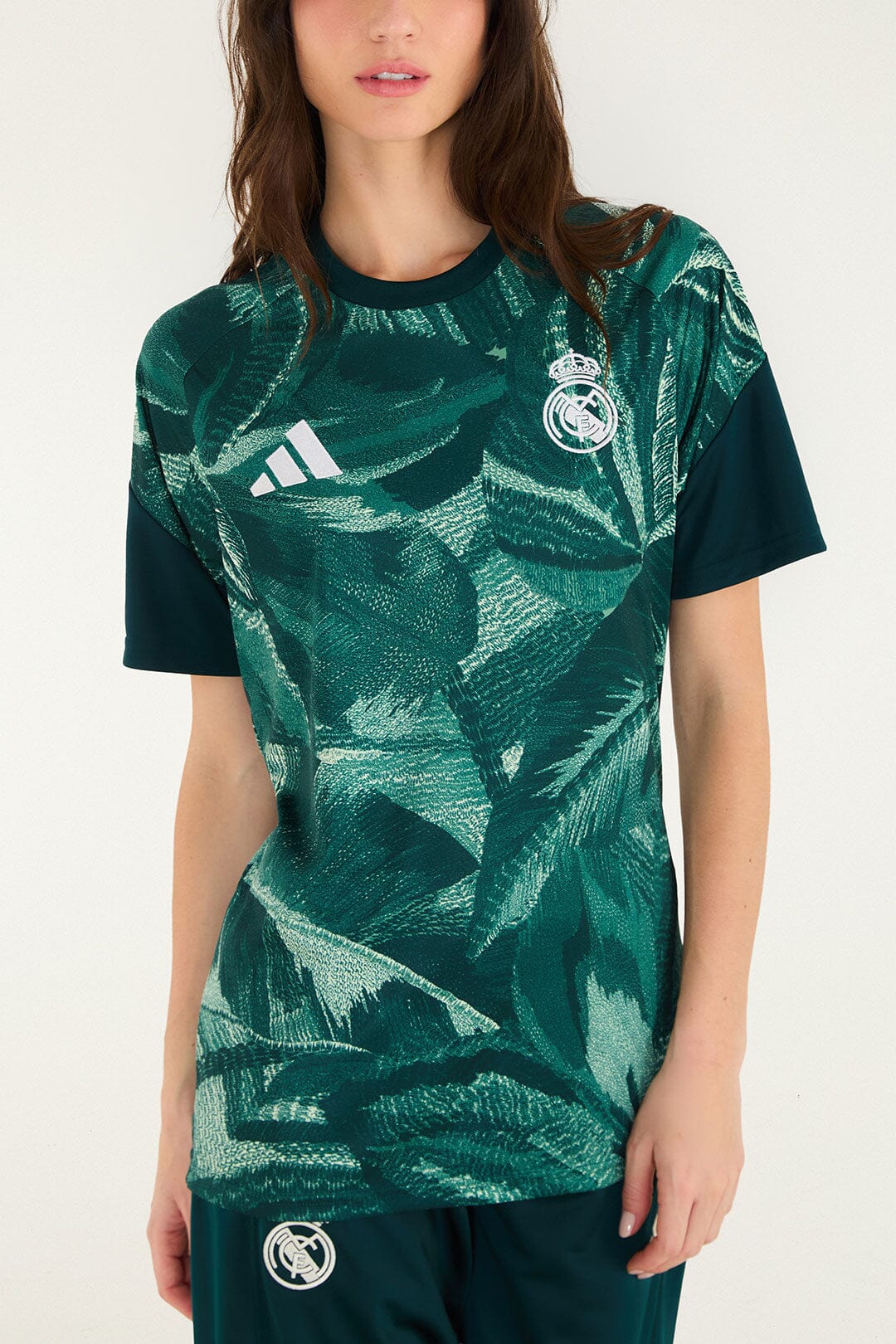 FARM Rio model wearing the Tshirt Adidas Abstract Forrest Green