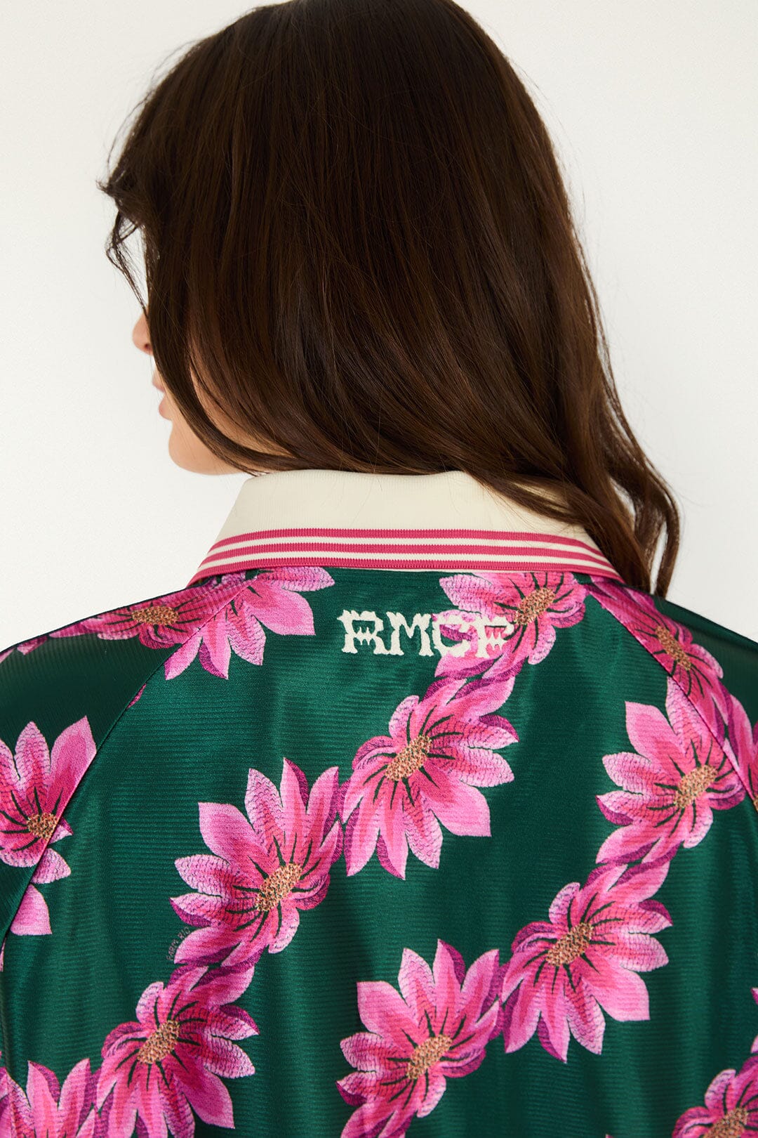 FARM Rio model wearing the Tshirt Adidas Flowerbana Green