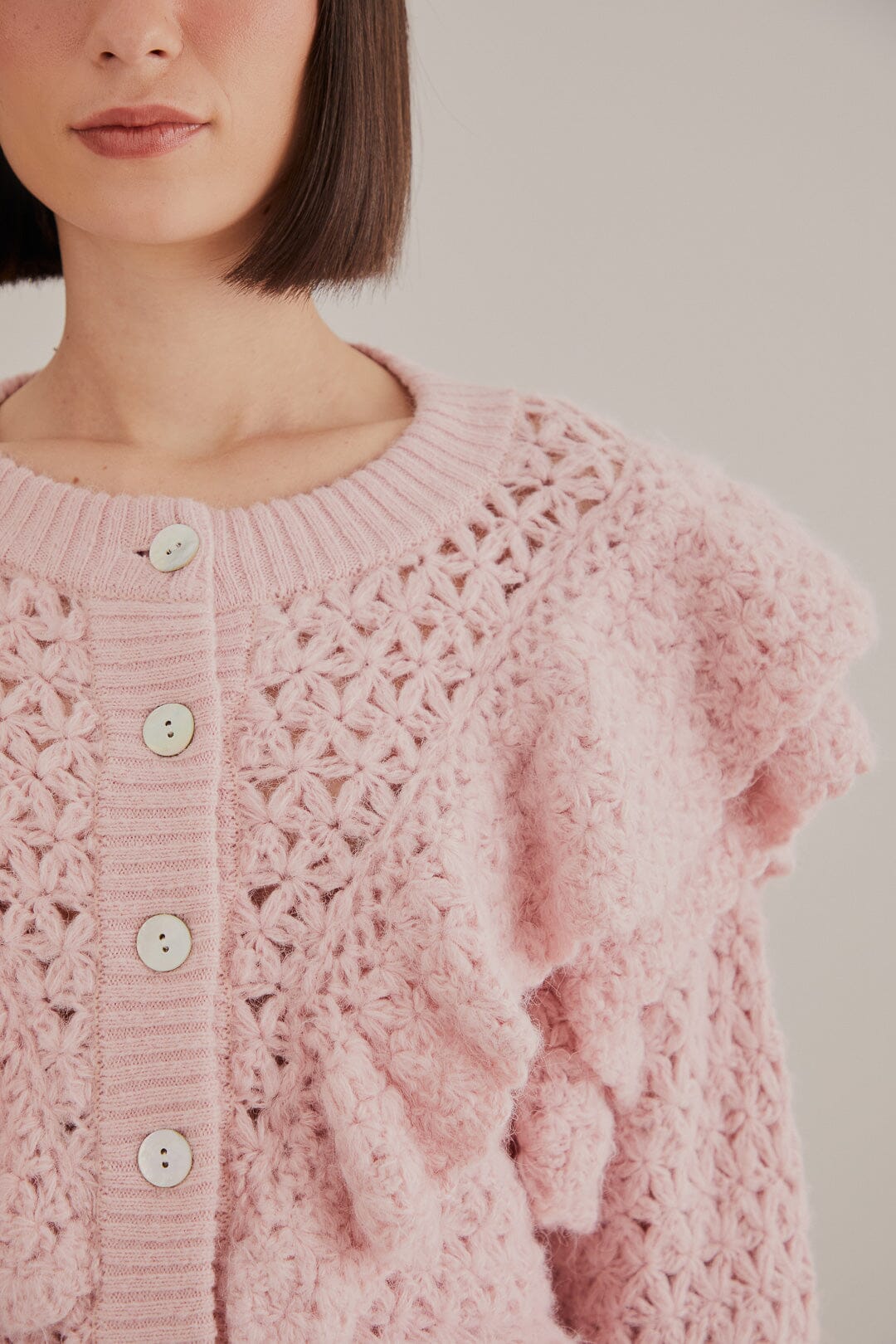 Cardigan en tricot à texture de fleur rose